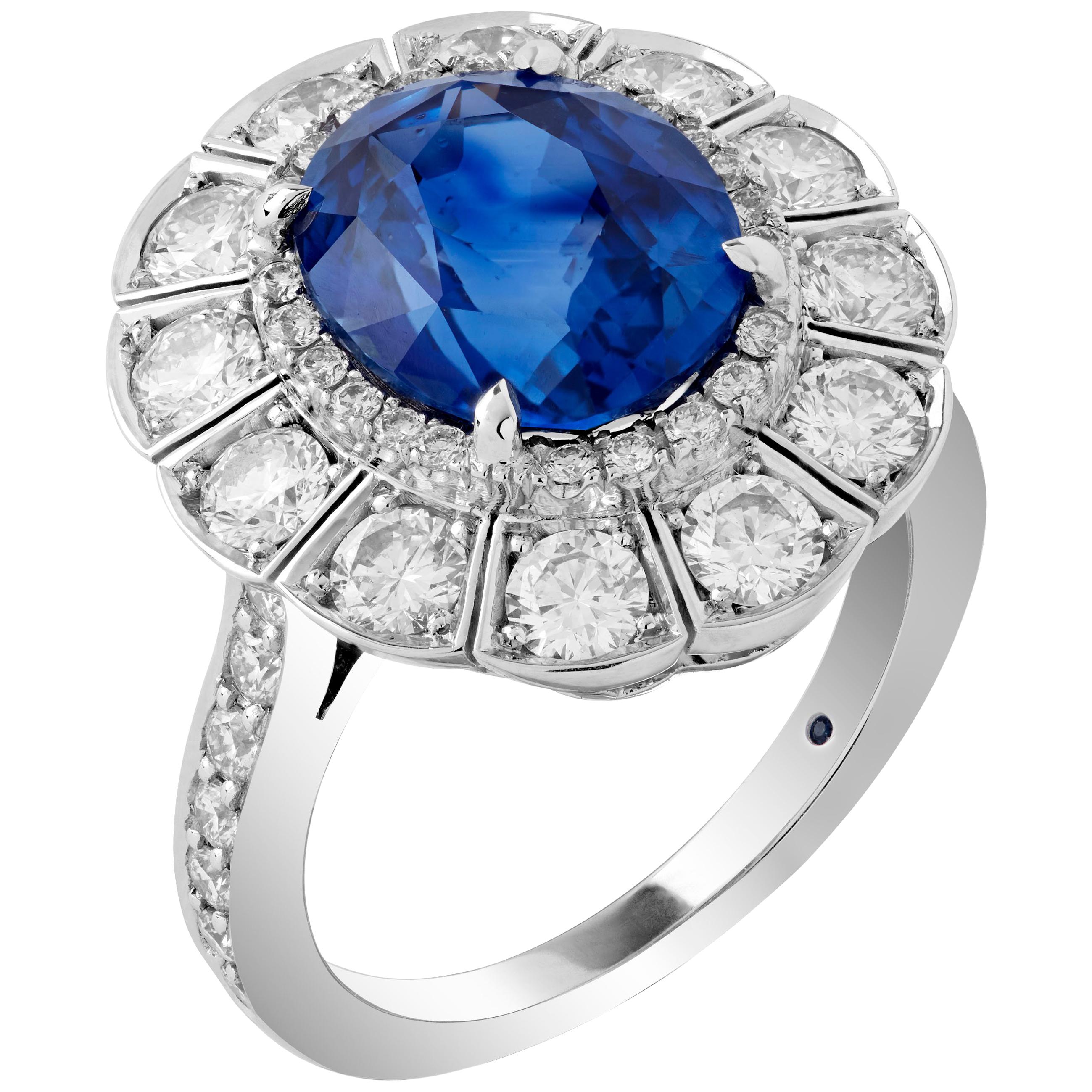 Garrard Platinum GRS 6.01 Carat Vivid Blue Oval Unheated Sapphire Cluster Ring