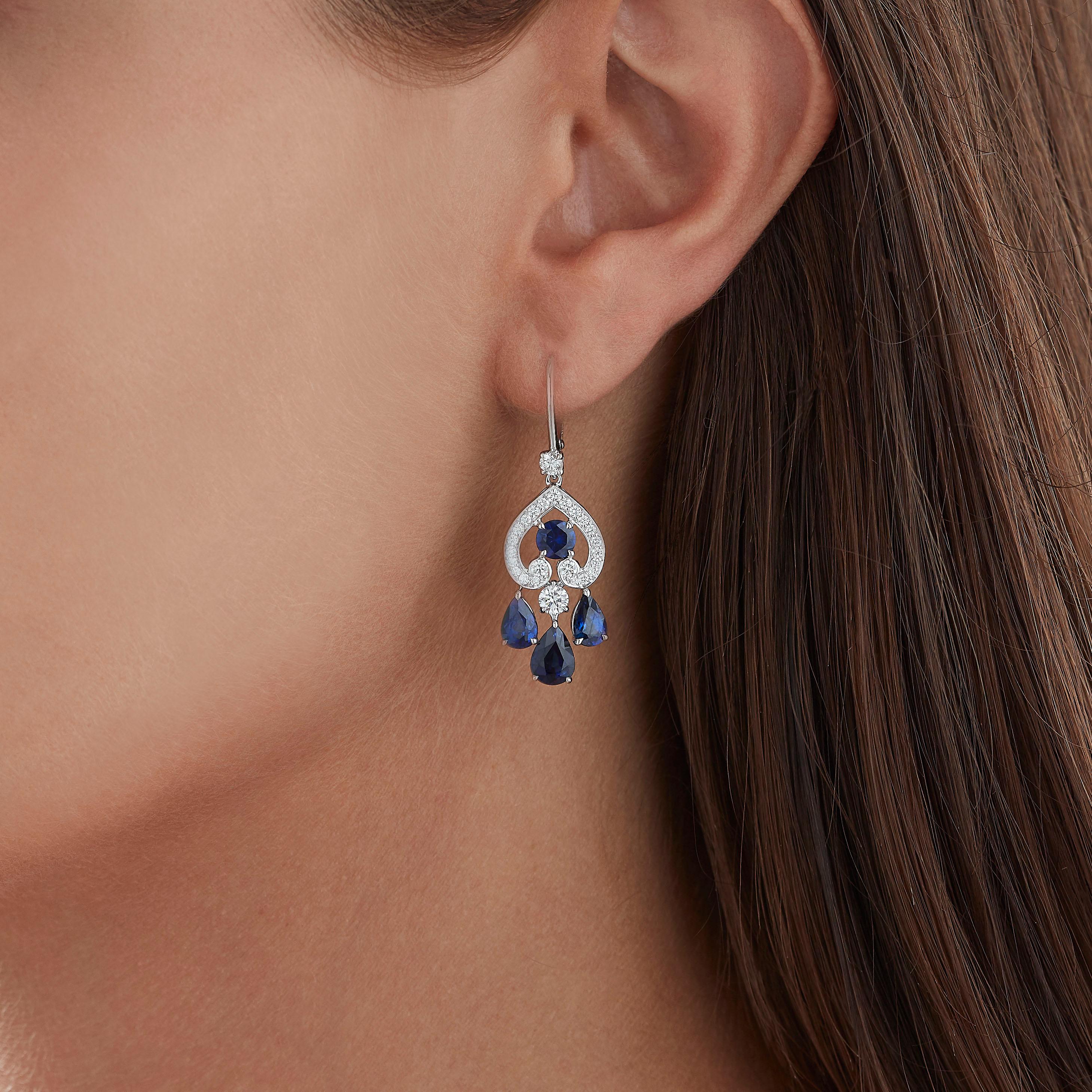 A pair of House of Garrard 18 karat white gold mini drop earrings from the 'Regal Cascade' collection, set with round and pear shape sapphires and round white diamonds.    
                                                                            