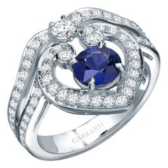 Garrard 'Regal' 18 Karat White Gold White Diamond and Round Blue Sapphire Ring