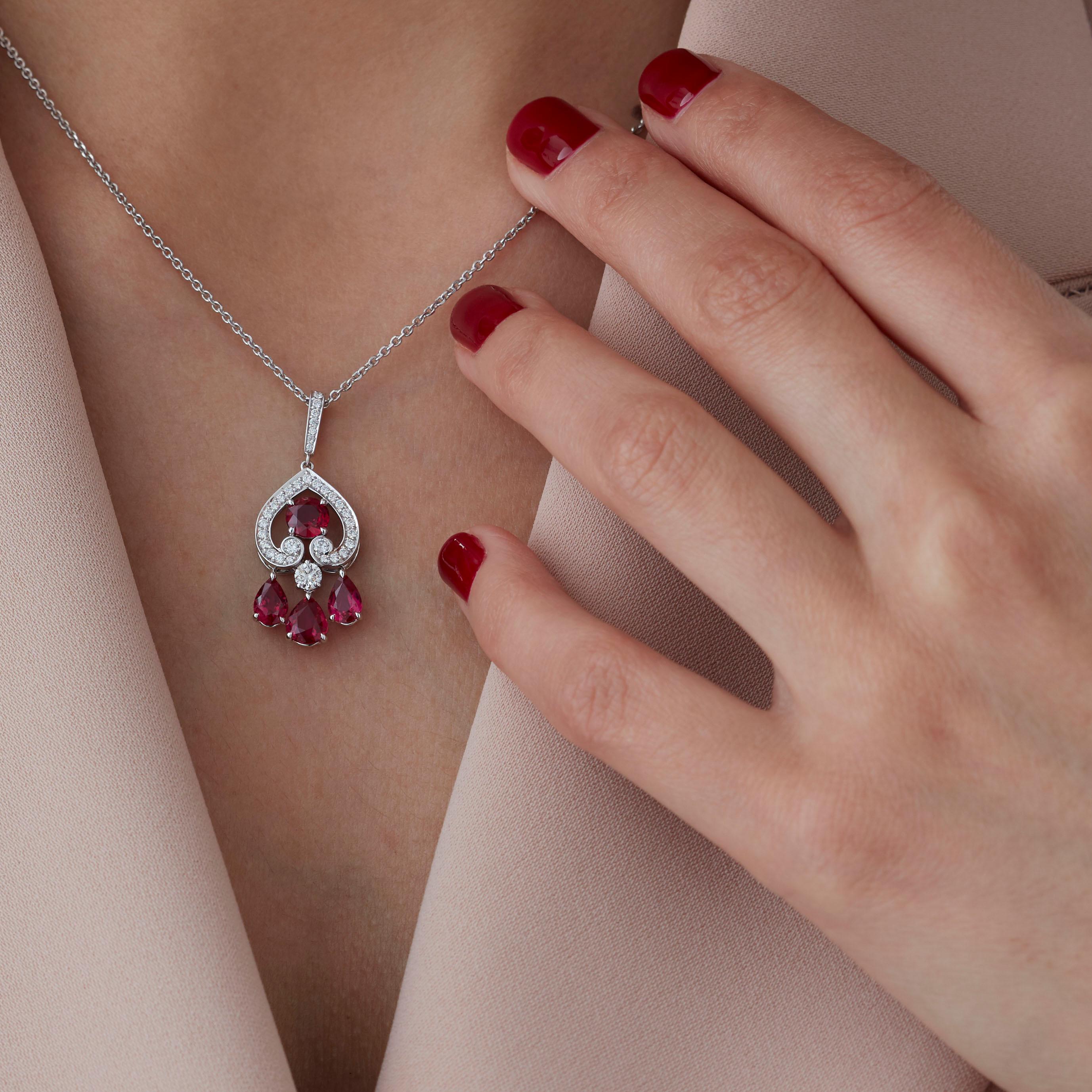 A House of Garrard 18 karat white gold mini drop pendant from the 'Regal Cascade; collection, set with round and pear shape rubies and round white diamonds.

1 round ruby
3 pear shape rubies
34 round white diamonds weighing: 0.44cts

Additional