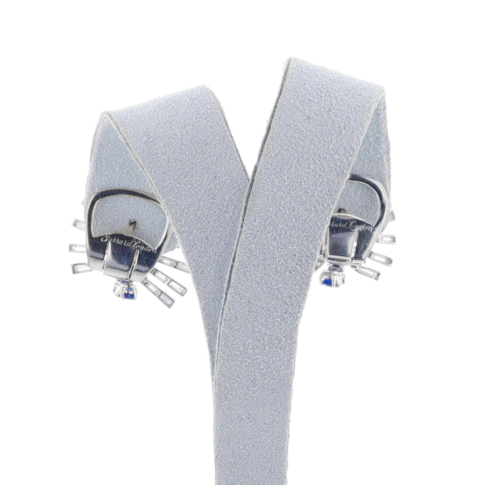Crafted in 18K white gold, these stunning earrings from Garrard feature a unique design with sapphire and diamond stones, weighing in at 15.60 grams. Perfect for any special occasion, these beautiful earrings add a hint of elegance and