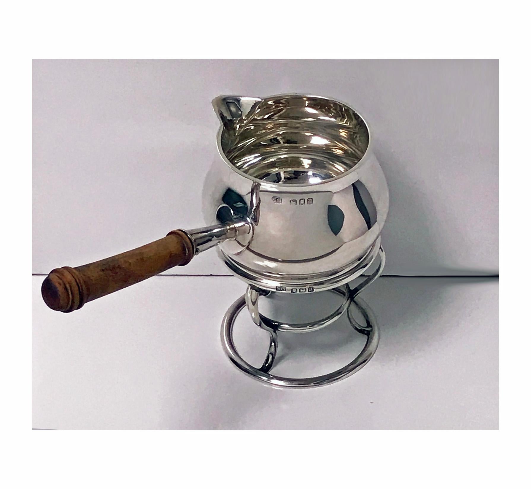 Sterling Silver Garrard Silver Brandy Saucepan and Stand, London, 1916