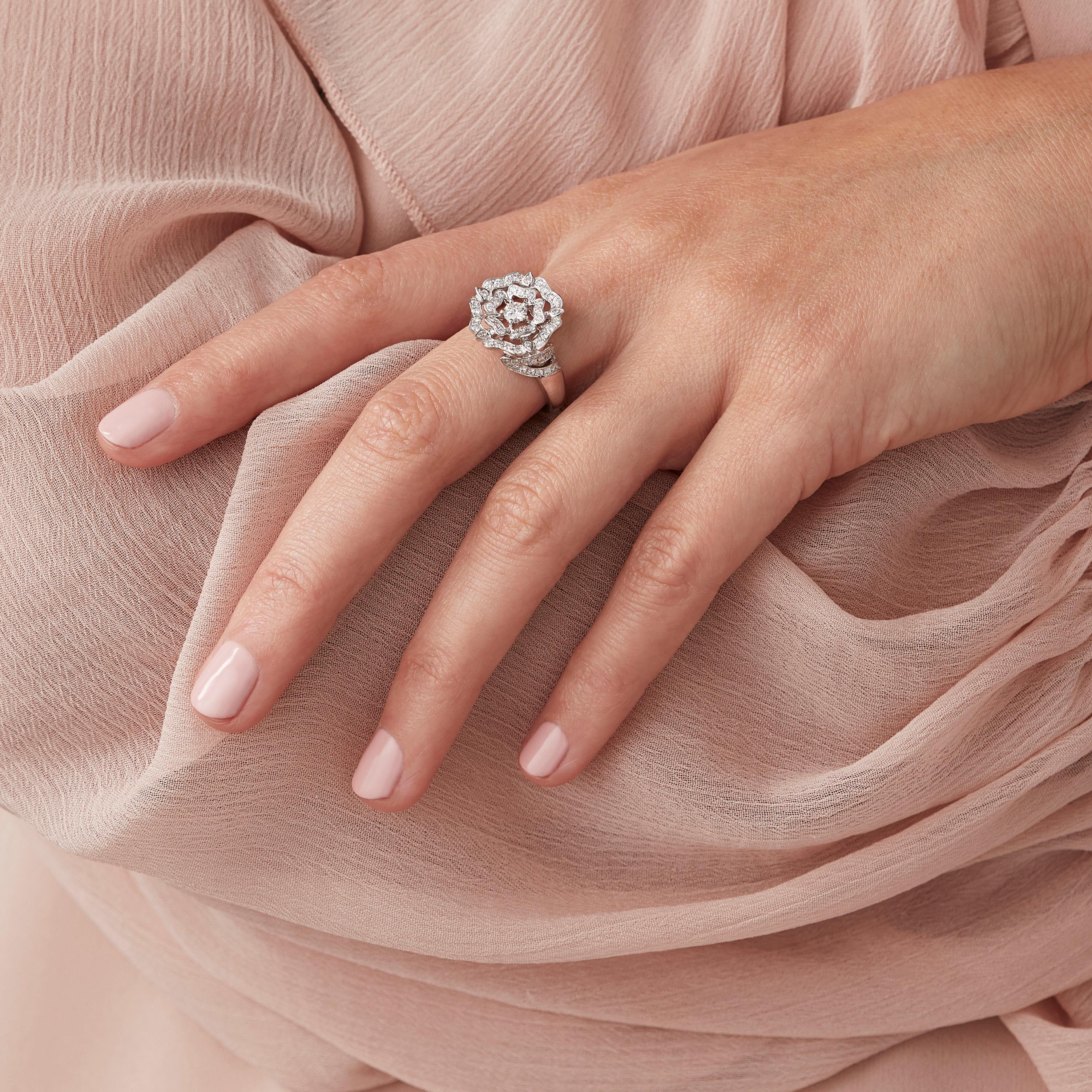 A House of Garrard 18 karat white gold ring from the 'Tudor Rose' collection, set with round white diamonds. 

82 round white diamonds weighing: 0.64cts 
Size 54 

Please note rings which have been resized cannot be returned

The House of Garrard is