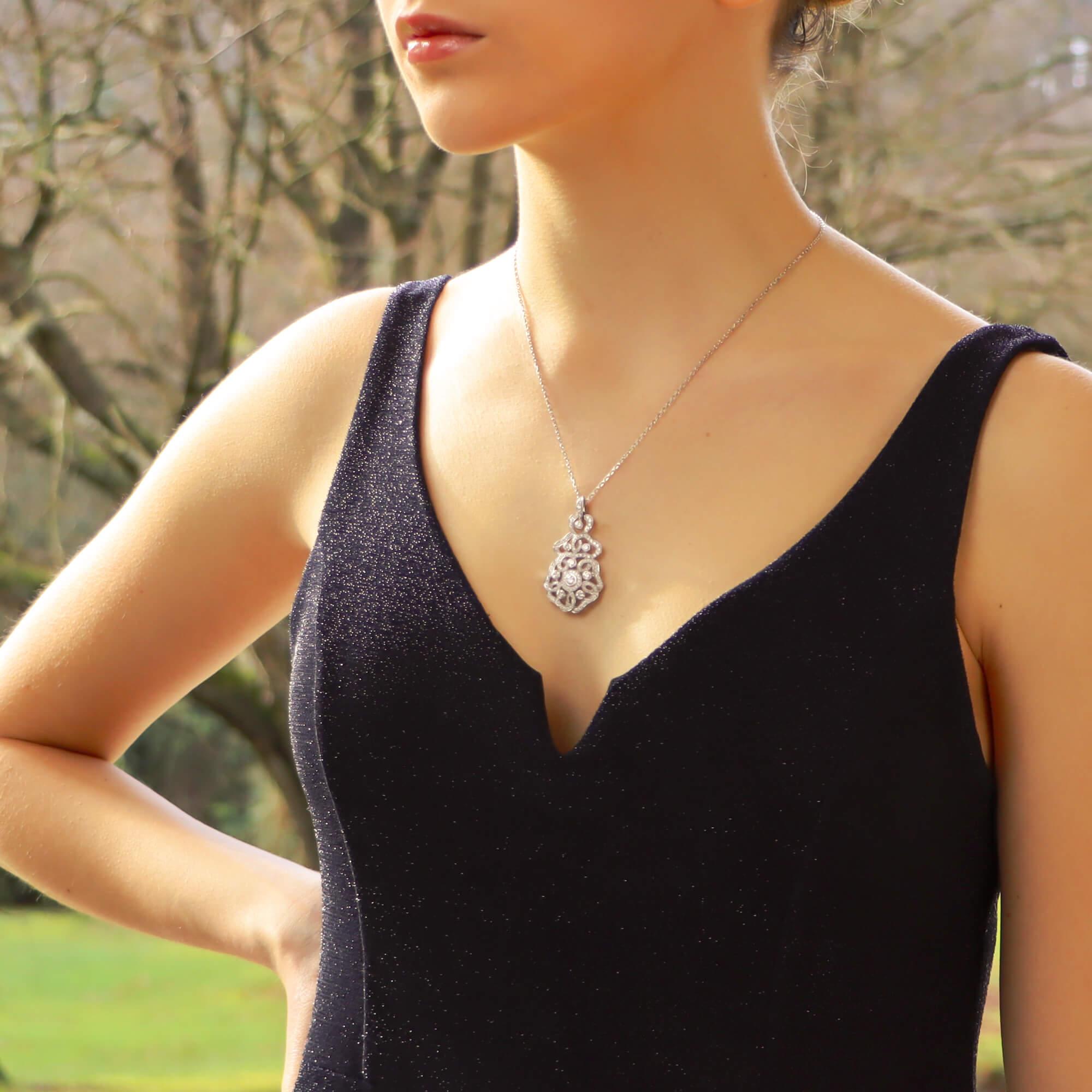 An extremely elegant Garrard Tudor Rose diamond pendant set in 18k white gold. 

The pendant is set with exactly 175 round brilliant cut diamonds and depicts a modern take on the traditional Tudor Rose motif. The rose itself is situated towards the