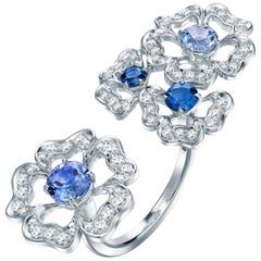 Garrard 'Tudor Rose Petal' 18 Karat White Gold Diamond and Blue Sapphire Ring