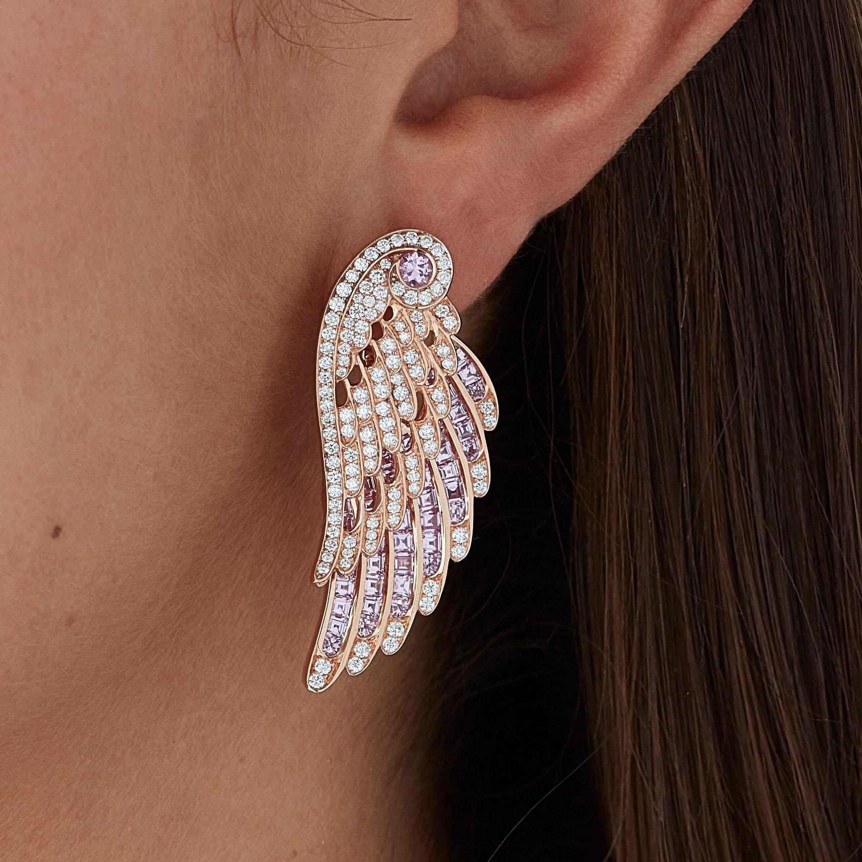 A House of Garrard pair of 18 karat rose gold drop earrings from the 'Wings Embrace' collection, set with round white diamonds and round and calibre cut pink sapphires.

222 round white diamonds weighing: 1.66cts
2 round pink sapphires weighing: