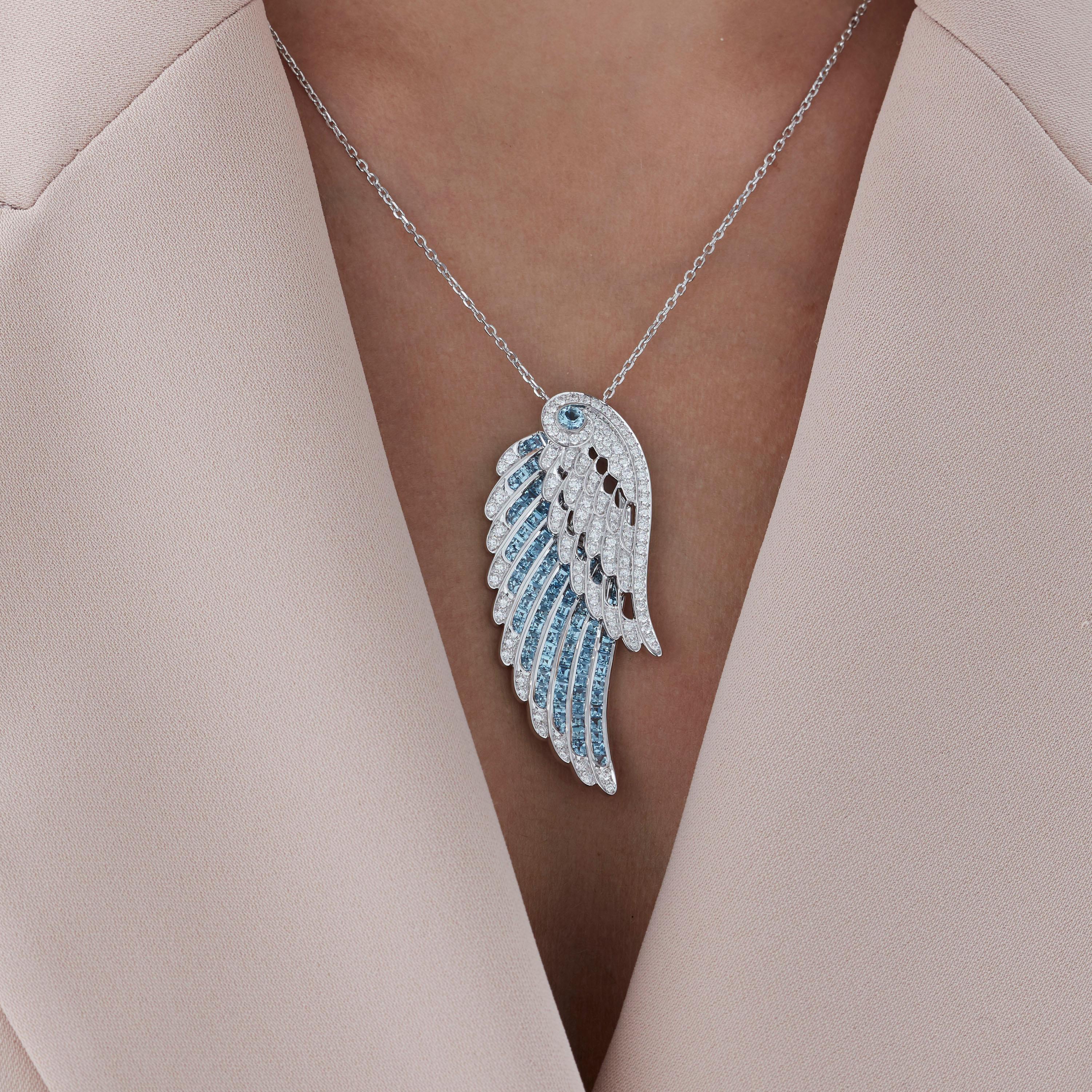 A House of Garrard 18 karat white gold double pendant from the 'Wings Embrace' collection, set with oval and calibre cut aquamarines and round white diamonds.
  
150 round white diamonds weighing: 1.76cts
94 calibre cut aquamarines weighing: