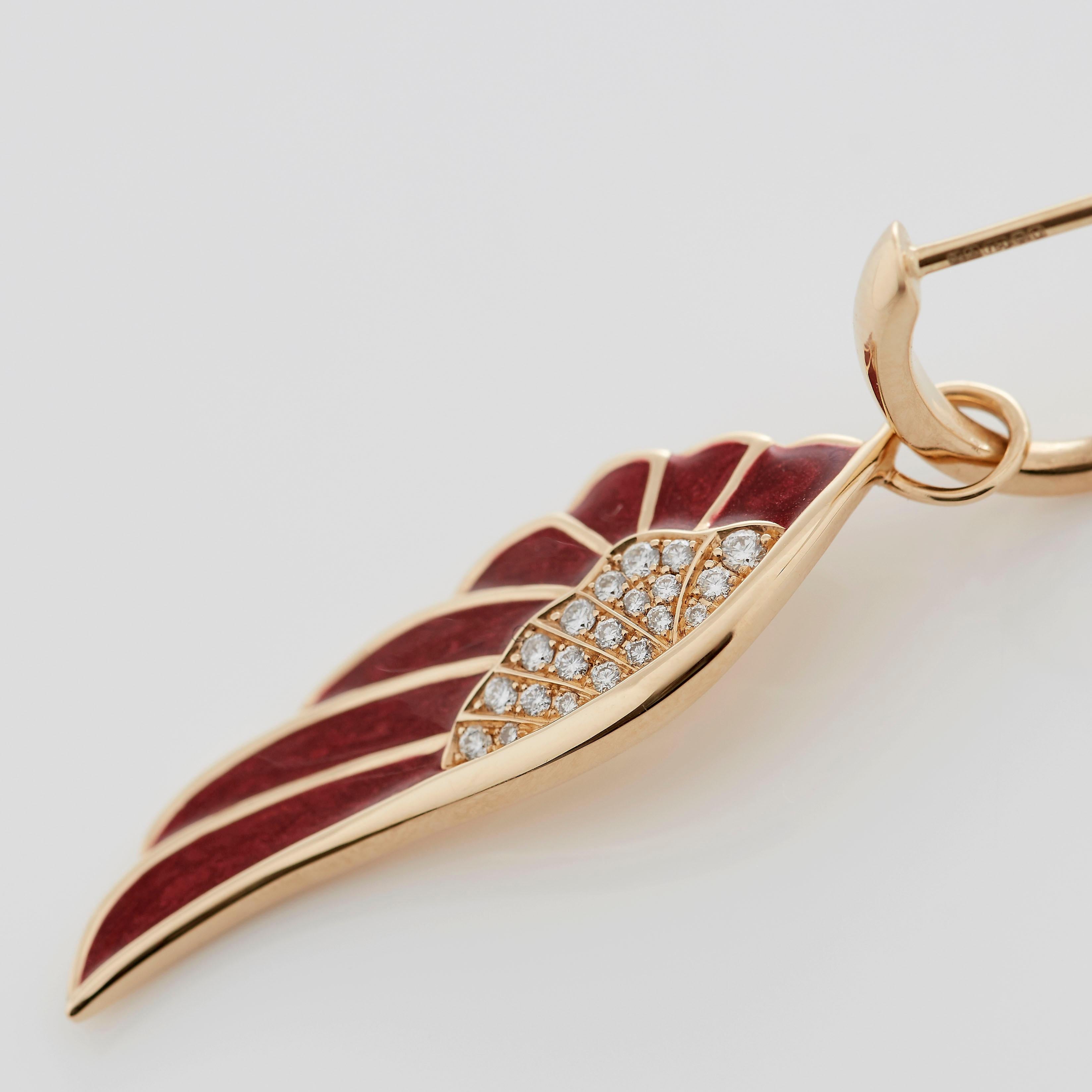 A House of Garrard 18 karat yellow gold earrings from the 'Wings Reflection' collection, set with round white diamonds and 'Autumn' coloured enamel.

40 round white diamonds weighing: 0.23cts

The House of Garrard is the longest serving jeweller in
