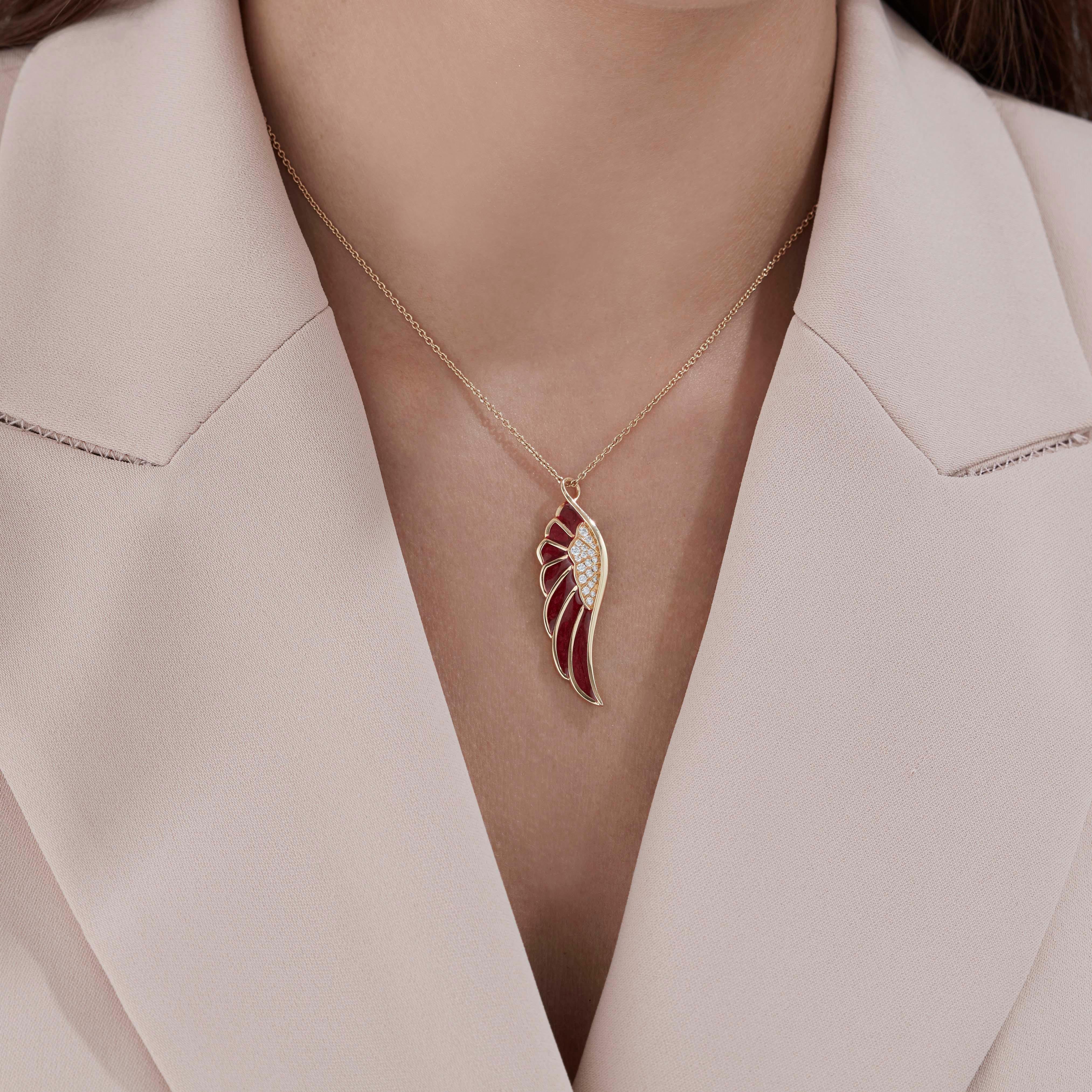 A House of Garrard 18 karat yellow gold medium pendant from the 'Wings Reflection' collection, set with round white diamonds and 'Autumn' coloured enamel. 

20 round white diamonds weighing: 0.20cts 

The House of Garrard is the longest serving