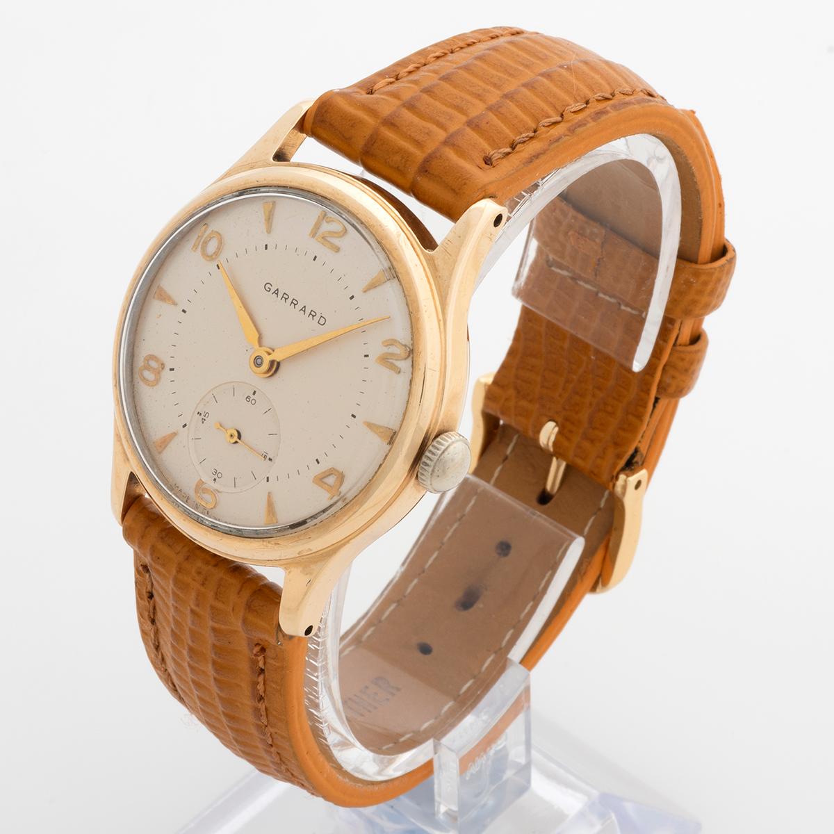 Garrard Wristwatch featuring Dennison Aquatite 9K Yellow Gold Case, Papers, 1962 In Good Condition In Canterbury, England