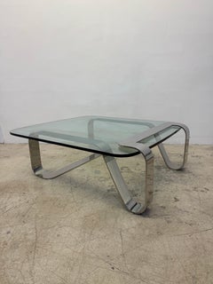 Tavolino da caffè in acciaio lucido e vetro "Odessey" di Garry Gutterman, 1974