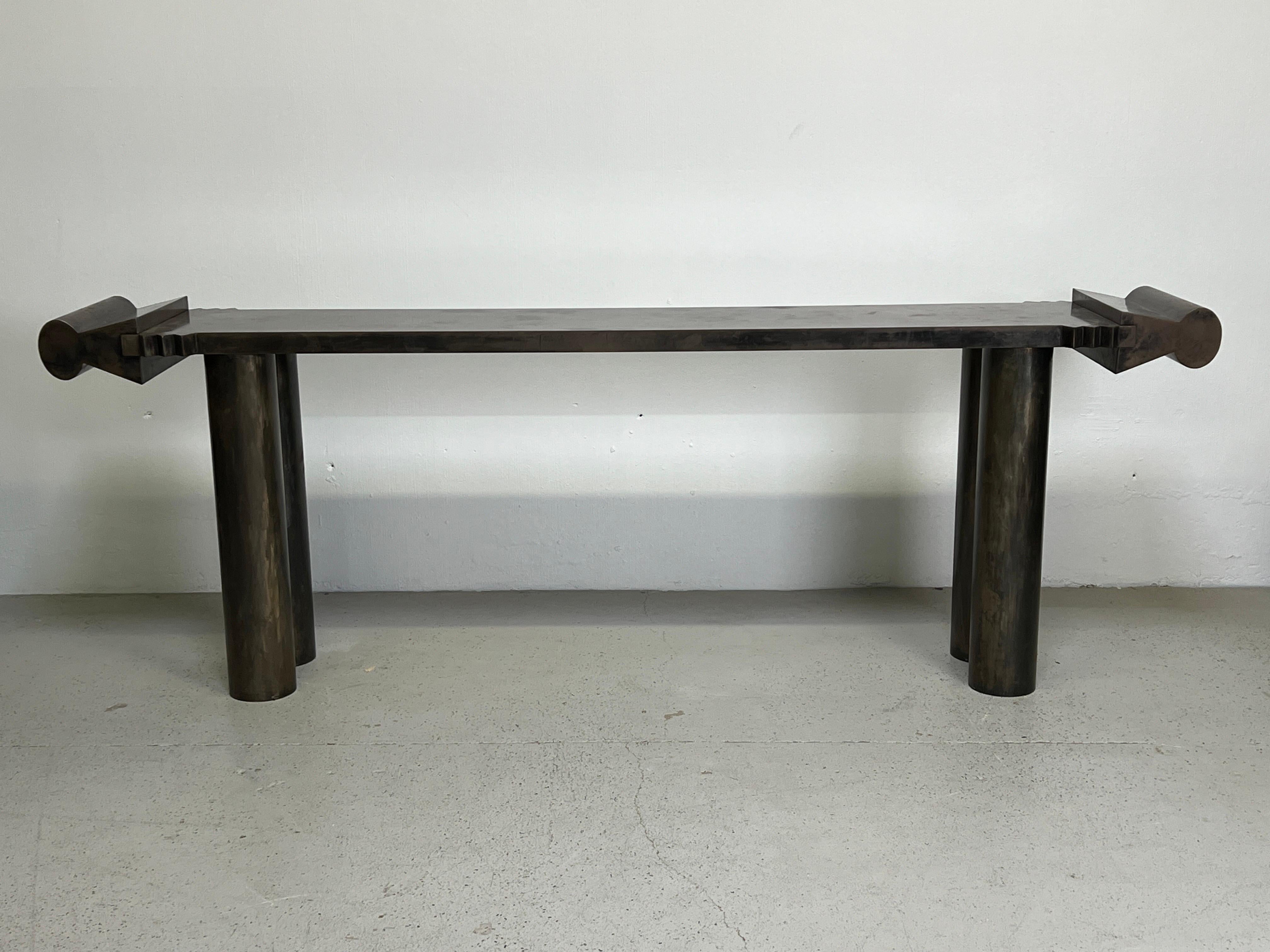 A large scale patinated steel console table titled 'Black Freighter' by Garry Knox Bennett. This work was a custom commission in 1990.
