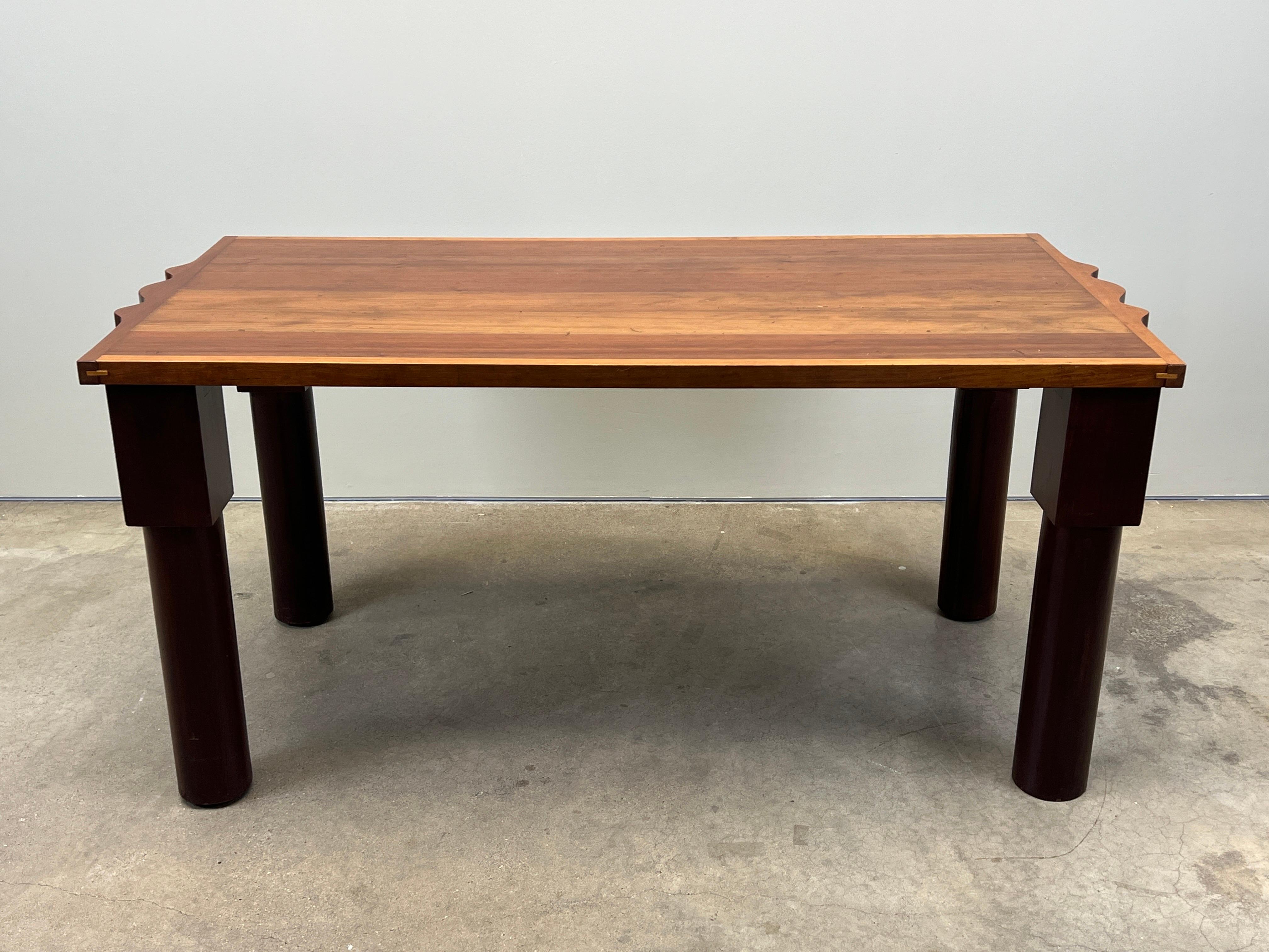 A custom table desk crafted by Garry Knox Bennett, signed and dated 1977. 
Bennett used track ties from California's Central Pacific Railroad (CPRR) for the legs. 