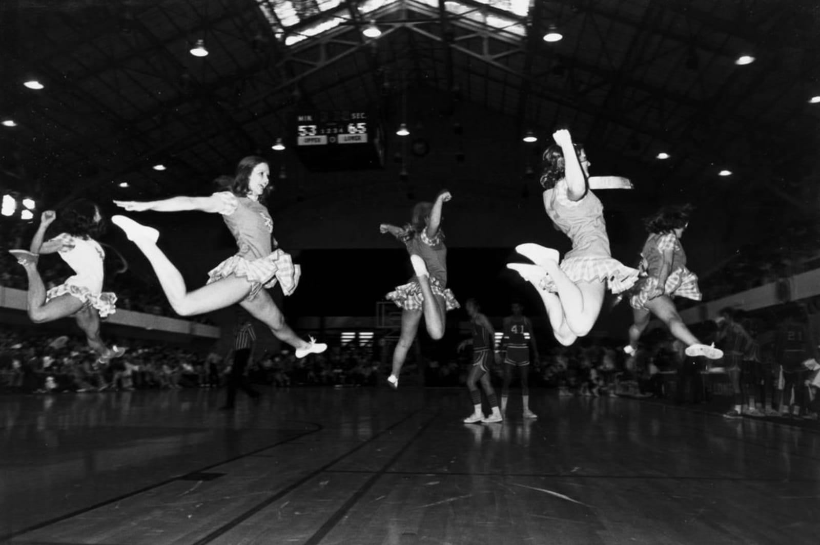 Garry Winogrand Black and White Photograph - Austin, Texas (cheerleaders jumping)