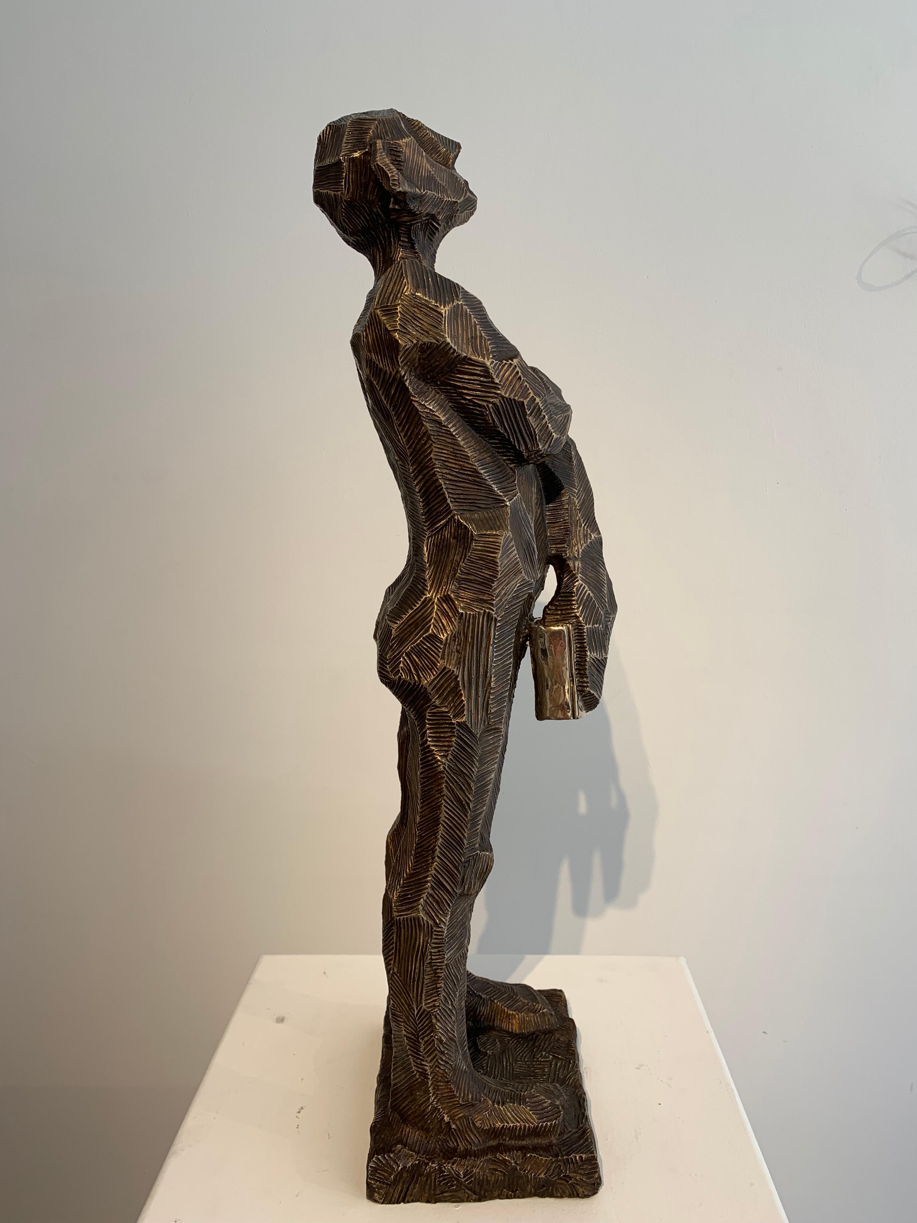 Man Holding Book - Gold Figurative Sculpture by Gary Betts