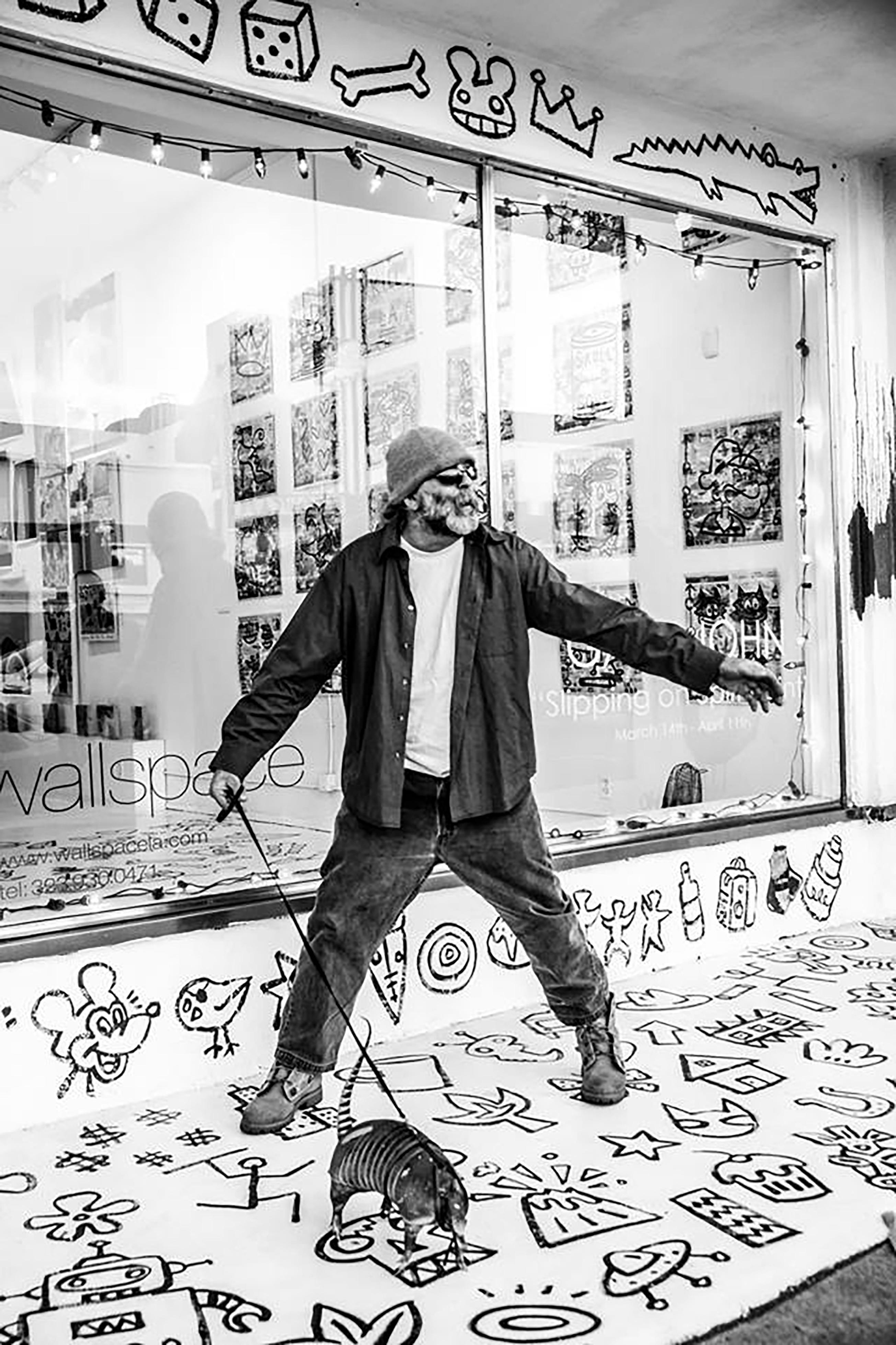 Gary John has been a street artist since 1985, originally from Seattle Washington, then moving to Venice Beach selling his art on the boardwalk for 10 years before exploding onto the world art market. Gary has now shown at art Basel, Miami, New York