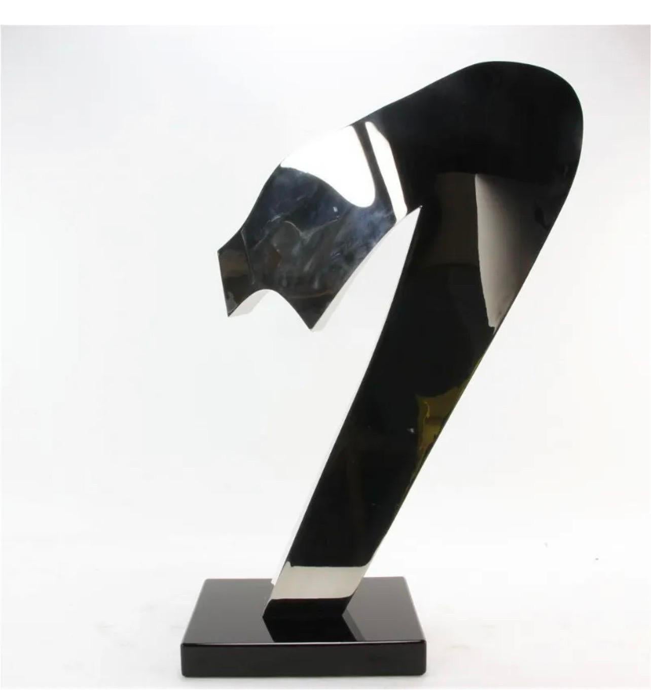 Gary Kahle (American, 1942- ) 
Metal abstract sculpture on black base, 
Hand signed and dated 1984
25 1/2