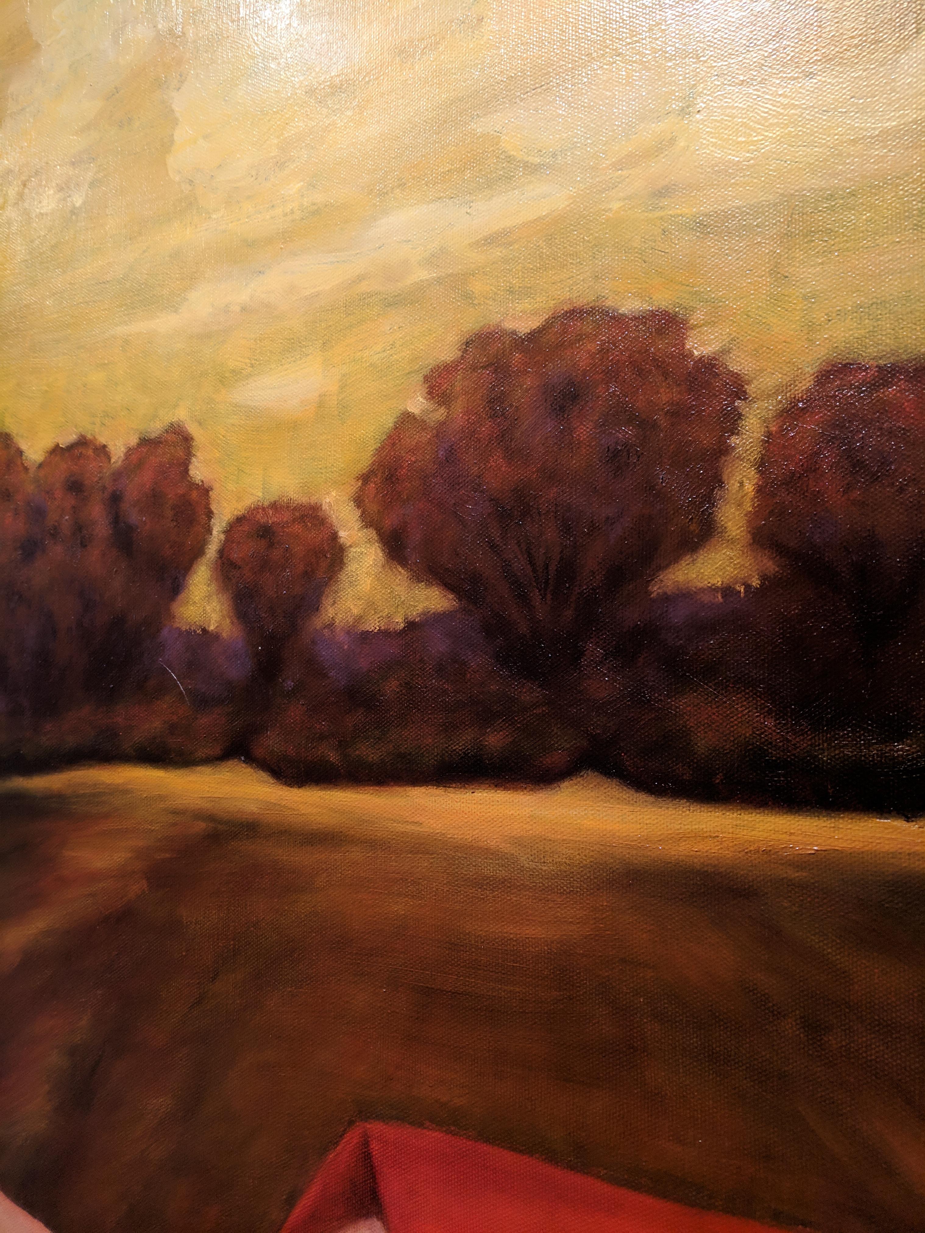 In this oil on canvas painting, beautifully framed, a torso is surrounded in fabric of a rich cadmium red. In the background is a field, where a tree line and sky are bathed in warm colors of ochre, olive green and cadmium yellow. There are notes of