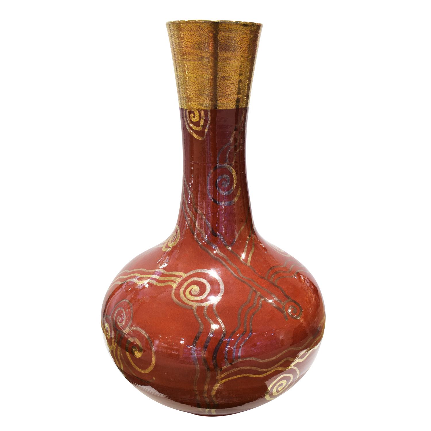 Hand-thrown ceramic vase in Chinese red with applied gold decorative motif by Gary McCloy, American 1970s (signed on the bottom). This vase is impressive and has a lot of visual depth. The combination of Chinese red with gold overlaid is magnificent.