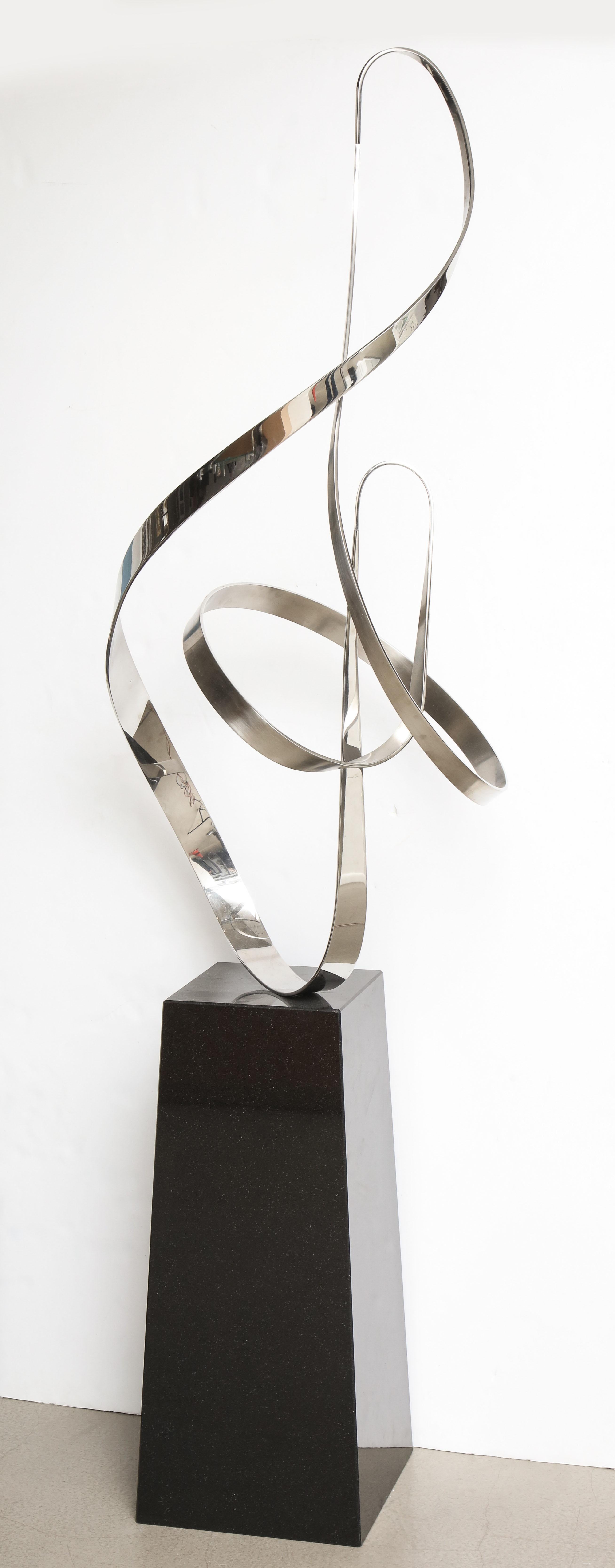 Traczyk manipulates the metal into breathtakingly balanced arabesques of seemingly lightweight form. Though static, these sculptures convey movement and grace.