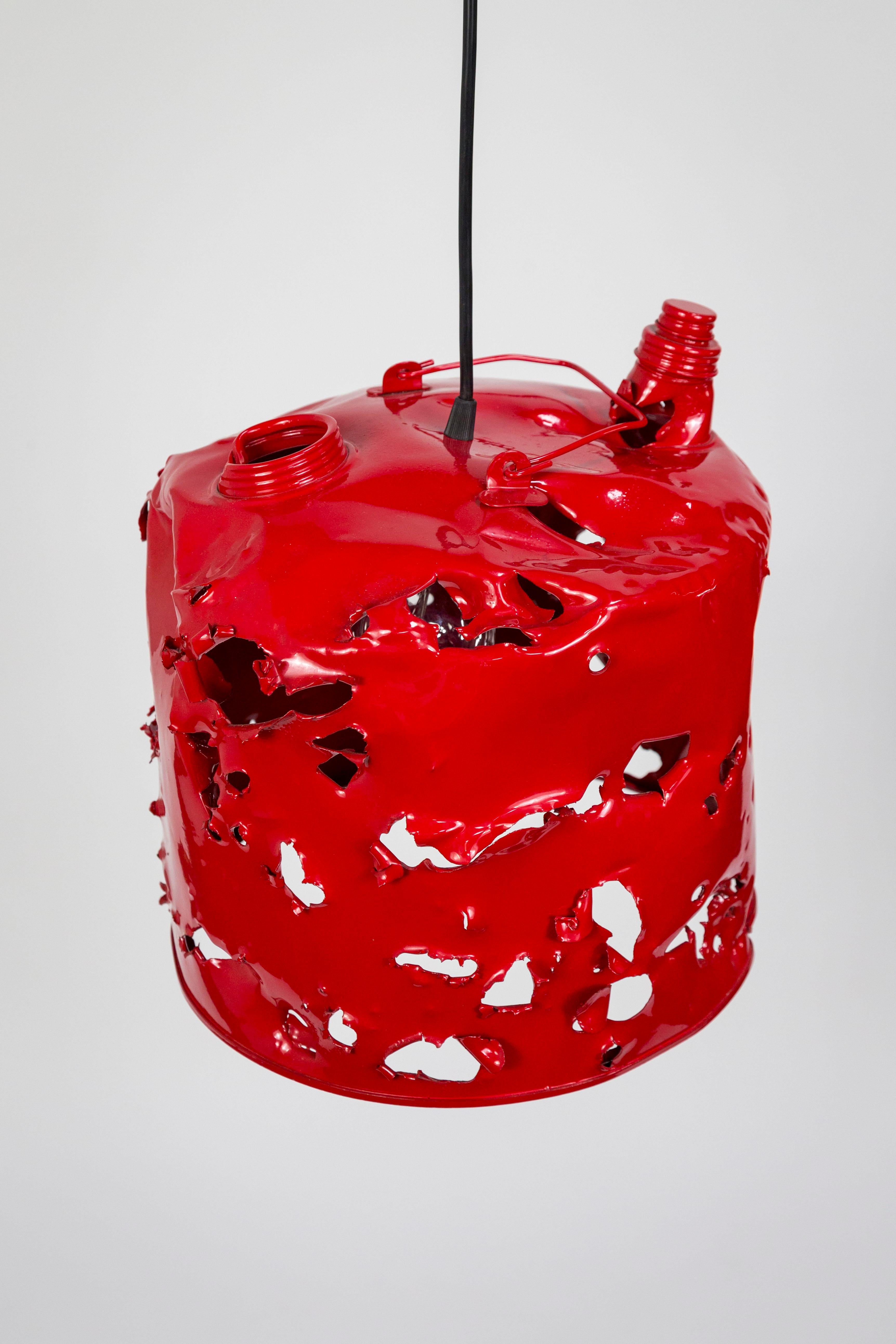 This powder coated, metal gas can is a bold art object by Charles Linder, who has been making artwork out of bullet-riddled objects for over 30 years. Growing up in Alabama he would find the abandoned targets and eventually repurpose them as