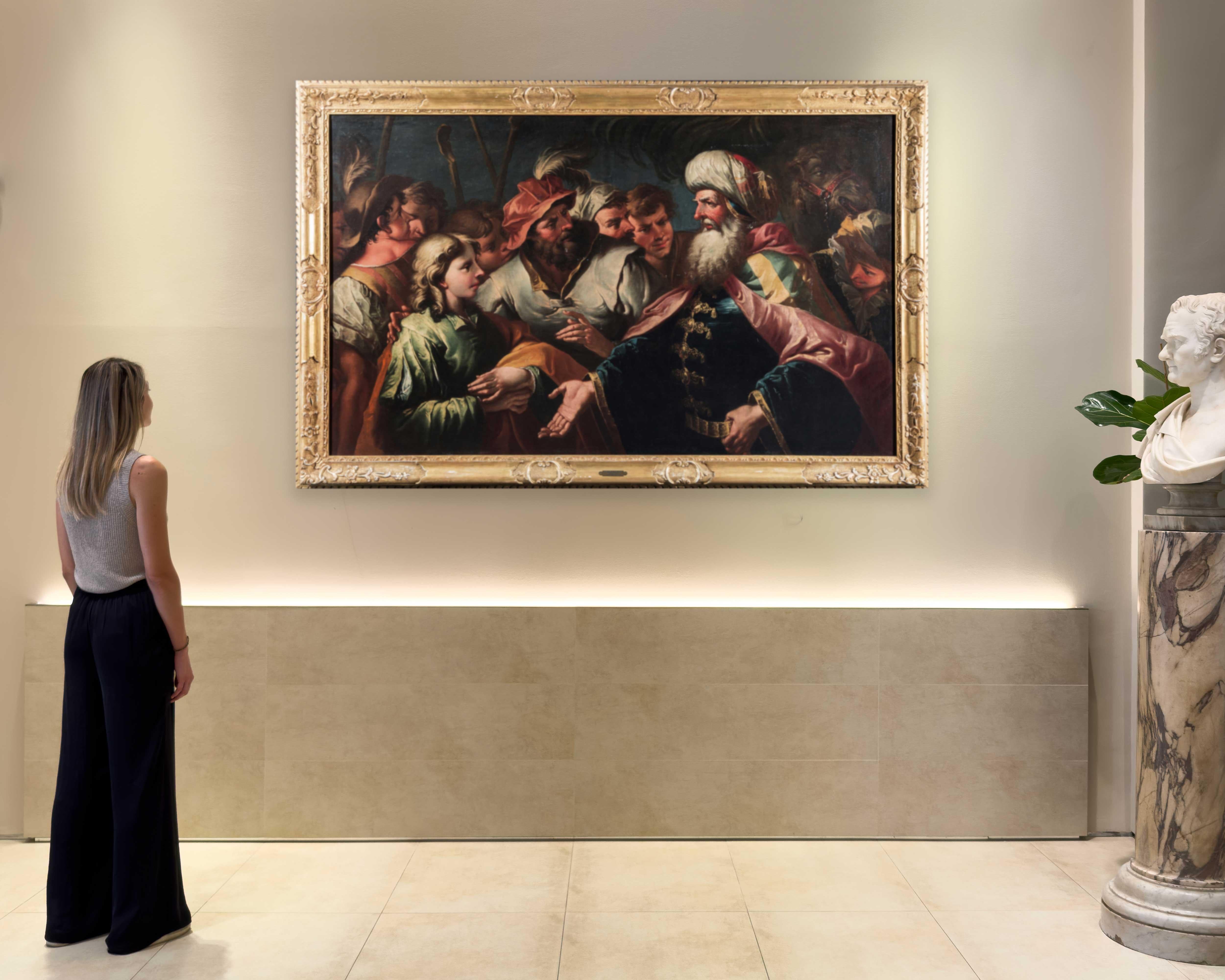The work depicts the famous episode in which Joseph, one of Jacob's twelve sons, is sold by his brothers to Putiphar, head of the guards of the king of Egypt. 
Diziani became famous by designing theater sets, which enabled him to be called to Munich