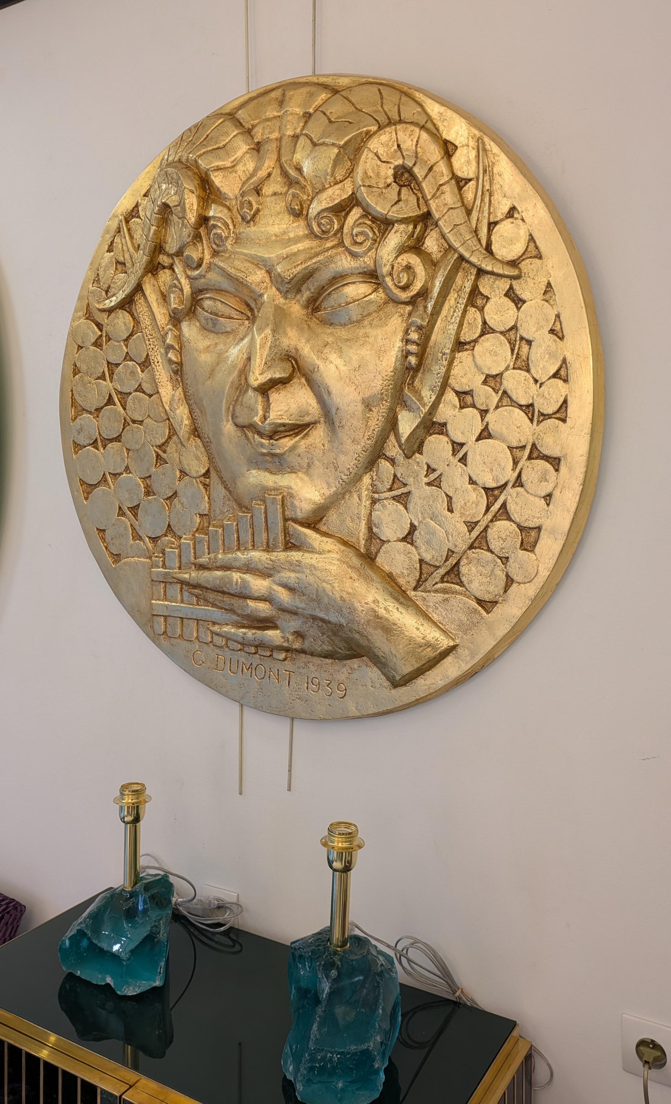 Milieu du XXe siècle Gaston Dumont,  Faune, bas-relief en plâtre patiné or, 1939 en vente
