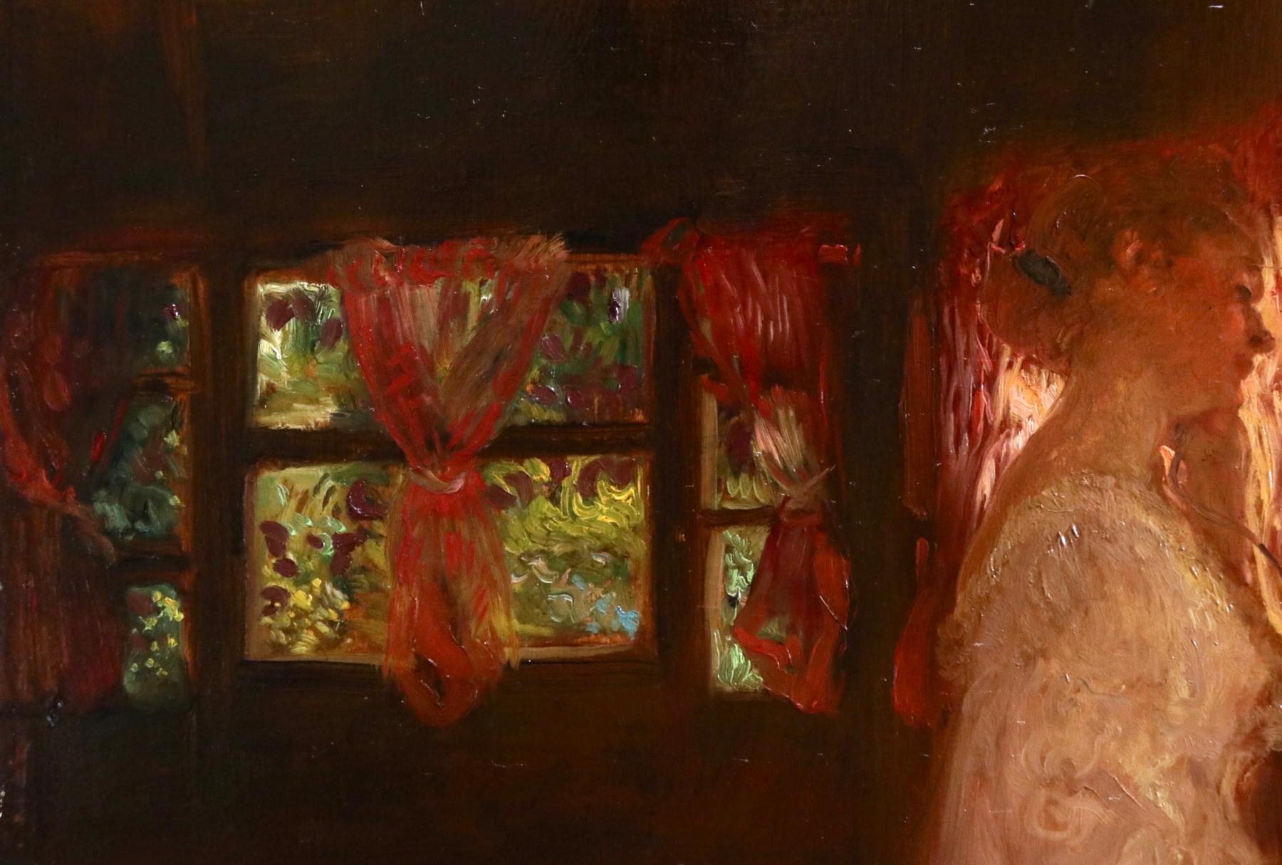 Oil on panel by Gaston La Touche depicting an elegant woman in a white gown standing by the windows as she speaks on the telephone. The light coming the sheer, red curtains illuminates the room with a pink glow. Signed lower right and titled verso.