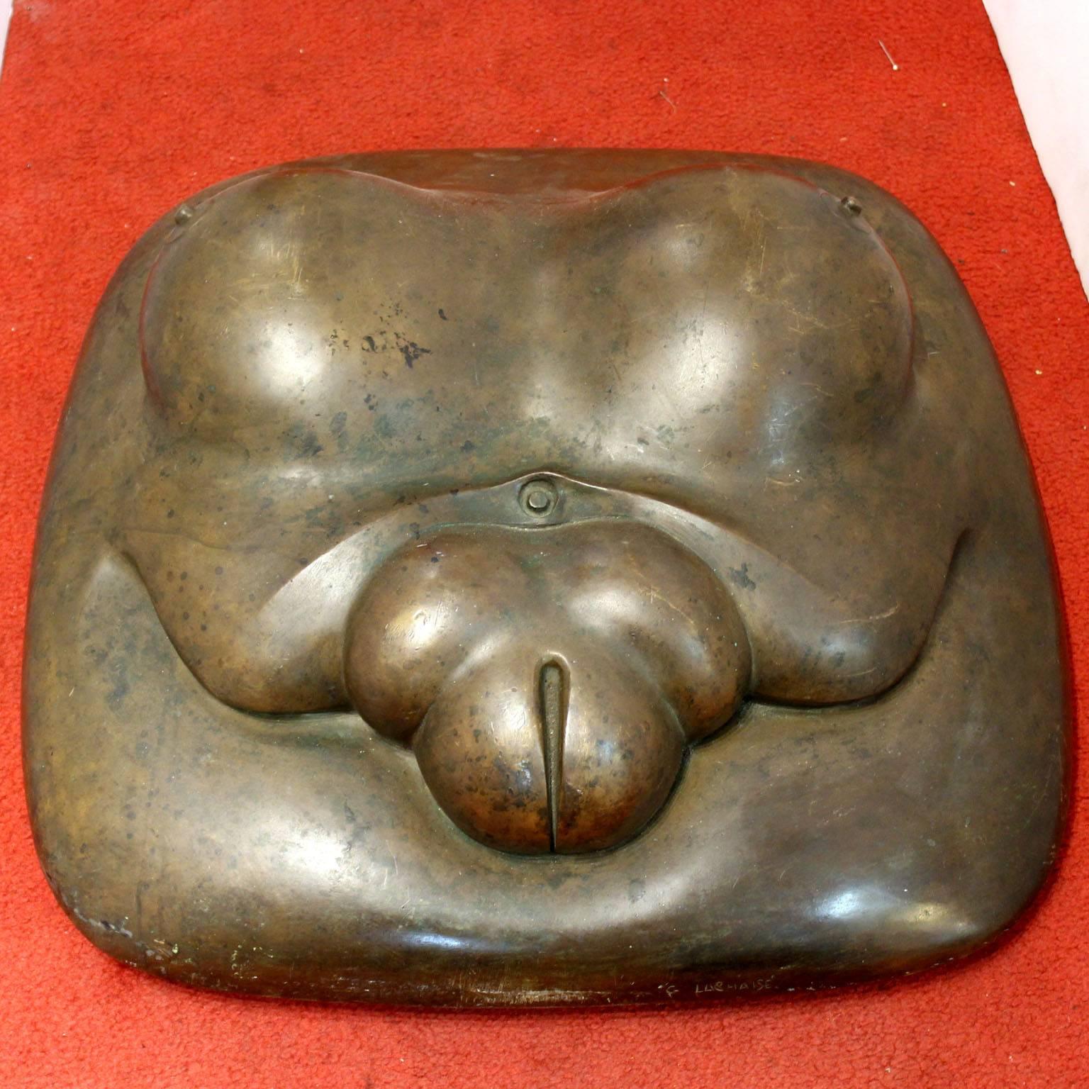 A bronze sculpture of a stylized reclining female torso by celebrated French-born American modernist sculptor Gaston Lachaise (1882-1935). Signed G. Lachaise and marked 'Roman Bronze Works N-Y'. Good condition with minor scratches to patina.