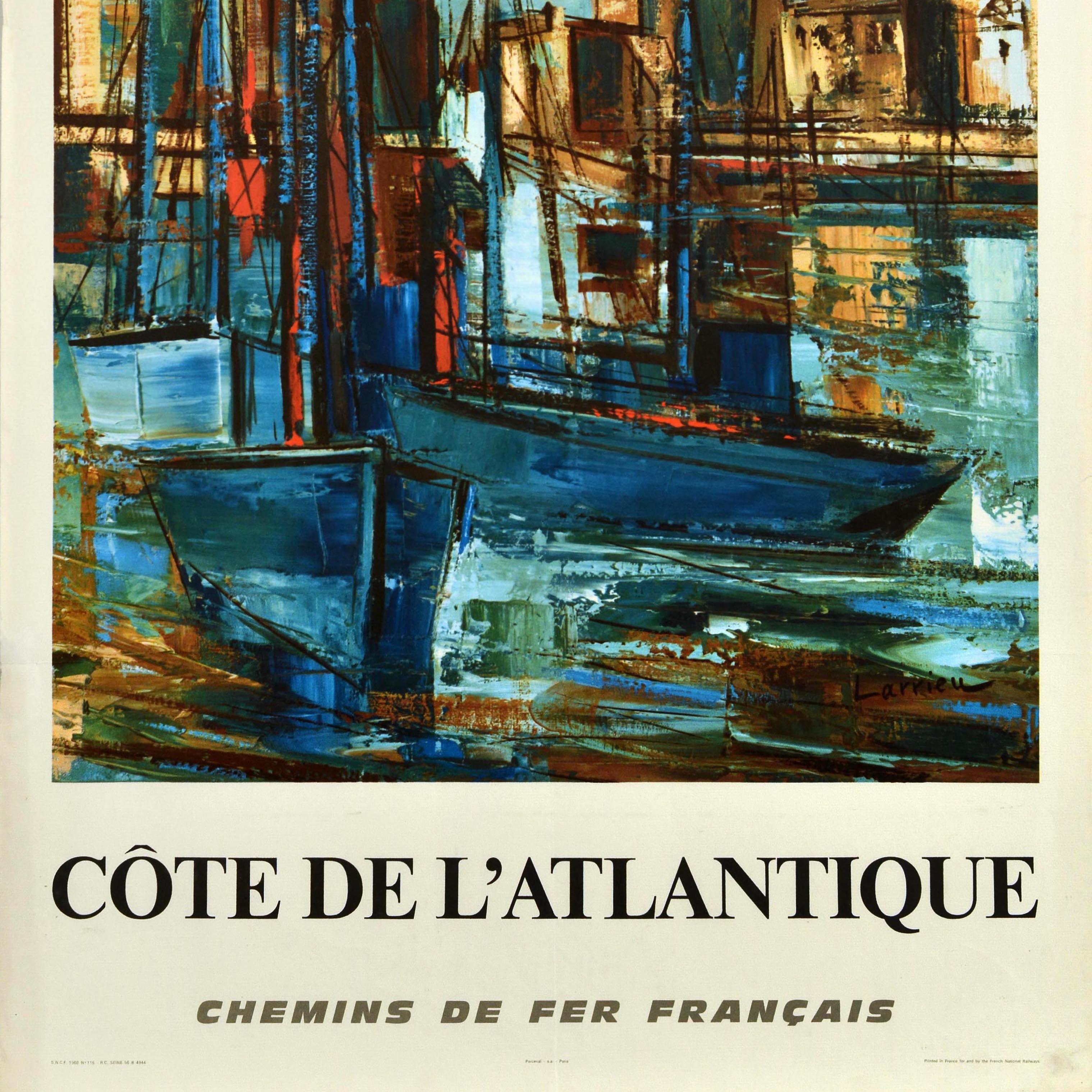 Original vintage travel poster advertising France The Atlantic Coast French Railways - Cote De L'Atlantique - featuring artwork by Gaston Larrieu (1908-1983) depicting a harbour scene with blue wooden sailing boats on the water and buildings in the