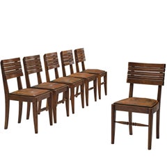 Gaston Poisson Set of Six Leather and Oak Dining Chairs