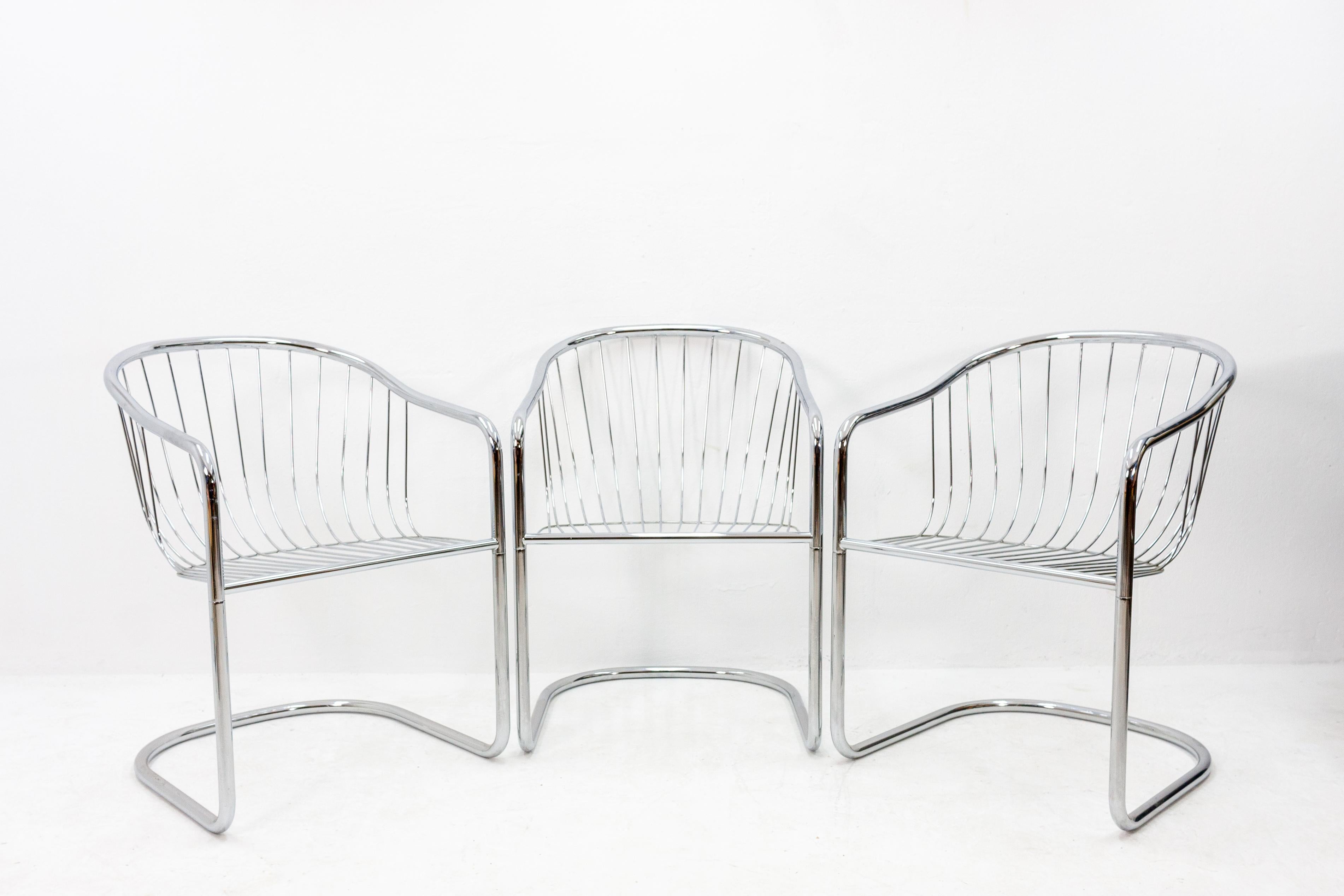 Two chrome wire frame bucket seats. Designed by Gastone Rinaldi for Rima, Italy, 1970s. With the original upholstery.
 