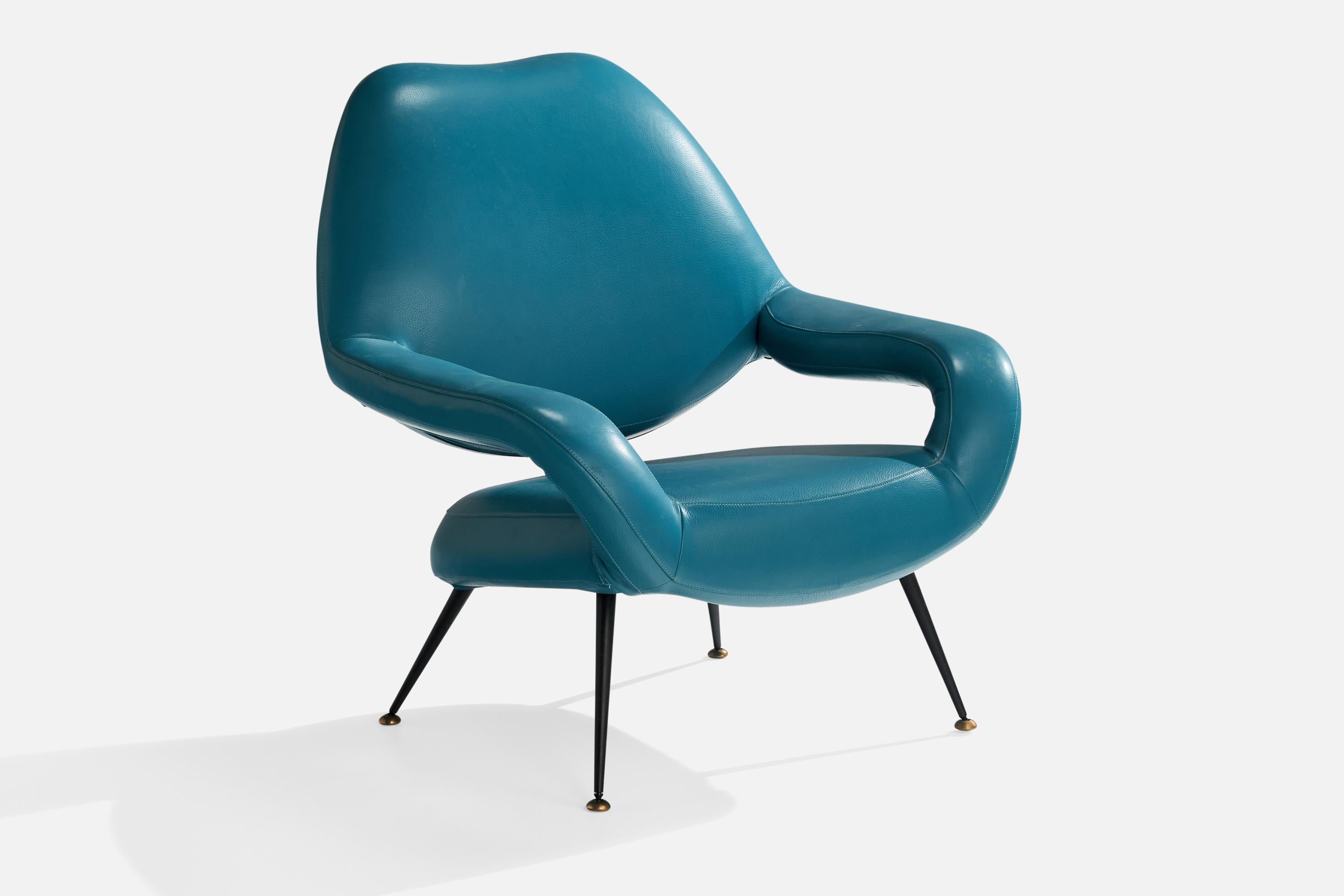 A blue leather, brass and metal lounge chair, Model DU55a, designed by Gastone Rinaldi c. 1955 and produced by Poltrona Frau, Italy, 1990s.

Seat height 15.5”.