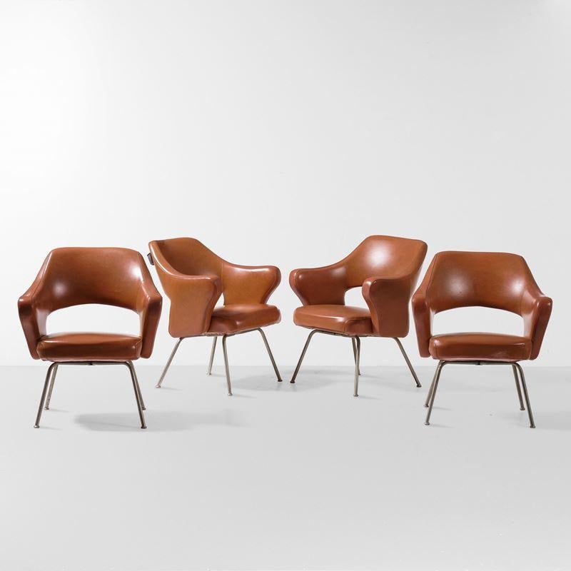 Set of four P16 armchairs with a tubular metal structure, seat, and back upholstered with a brown cognac shade skai. 
Designed by Gastone Rinaldi for Rima, Padova 1960s. 

Gastone Rinaldi was born in Padua on 16 November 1920. In 1916 his father