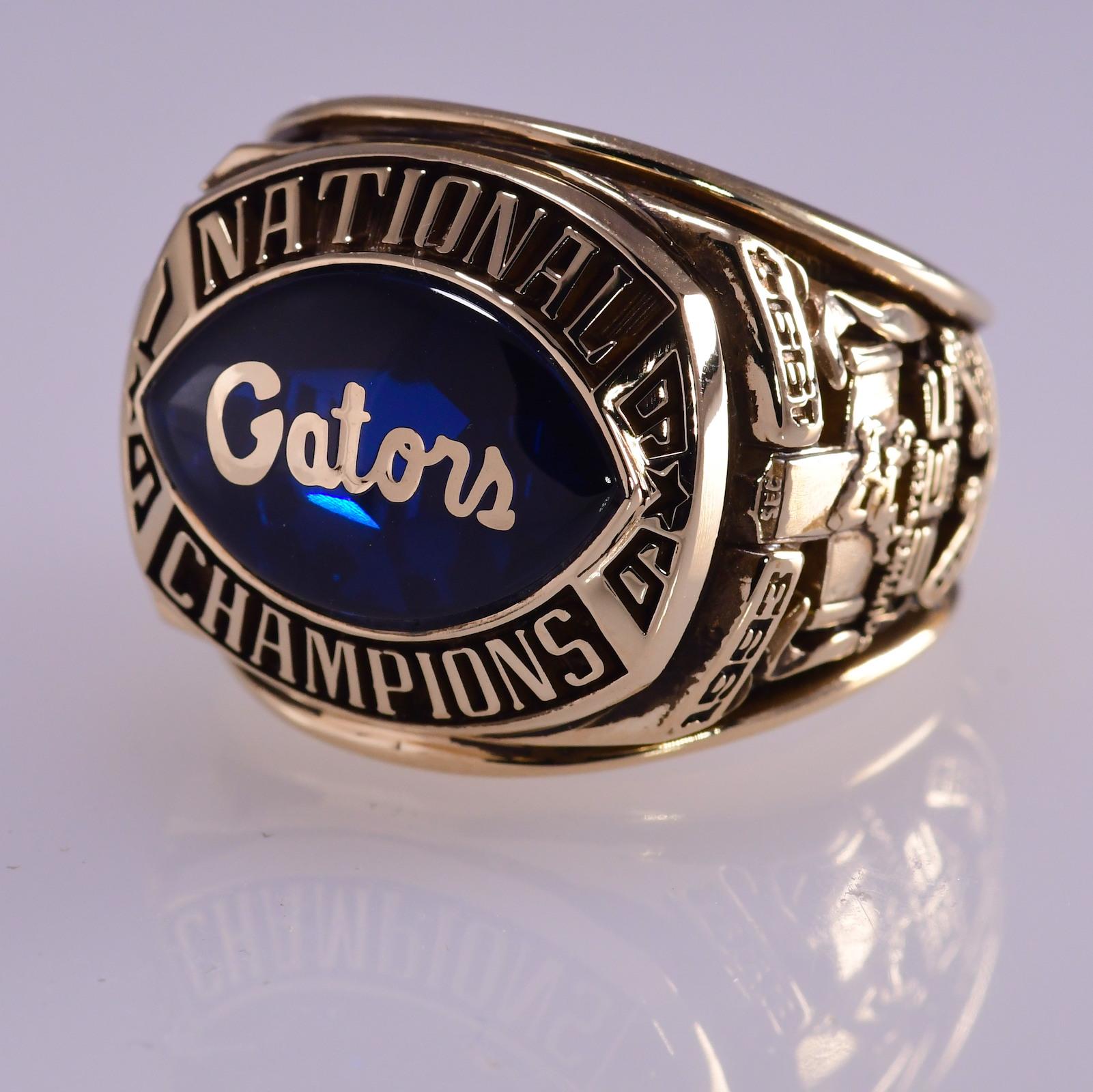Florida Gators National Football Champions Ring  (non player) Yellow Gold 10K 37.50 grams Artcarved 
Excellent Condition
Finger Size 13 
Purity: 10 Karat Yellow Gold 
Total Gram Weight: 37.50 grams
Note: Lightly Engraved Inside 