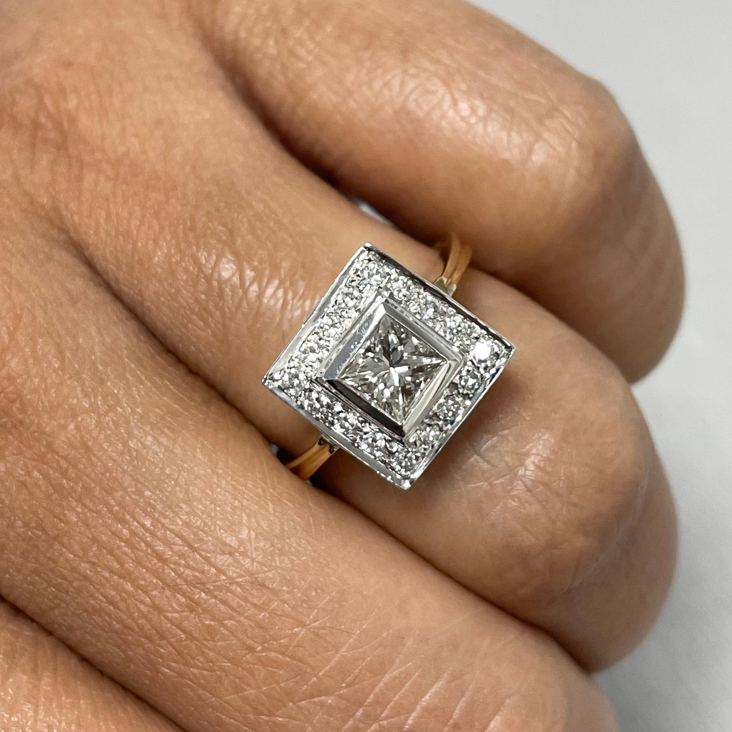 The Gatbsy Engagement Ring is bold and chic. With its strong geometric lines and unique shape it stands out leaving the onlooker perplexed and dazzled. 

Center Diamond Shape: Princess Cut
Center Diamond Weight: 0.70 ct 
Diamond Color: K
Diamond