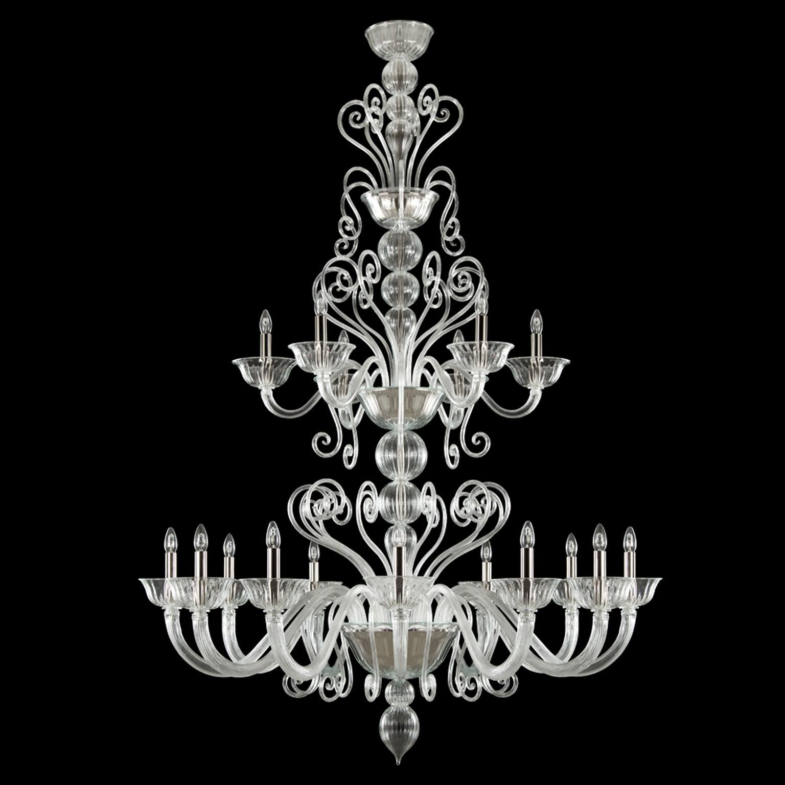Gatsby naked chandelier 12+6 arms clear artistic Murano glass by Multiforme
The Venetian chandelier Gatsby is the perfect combination of elegant and modern elements. The use of color featuring bright tones, the surface with straight ribs, the