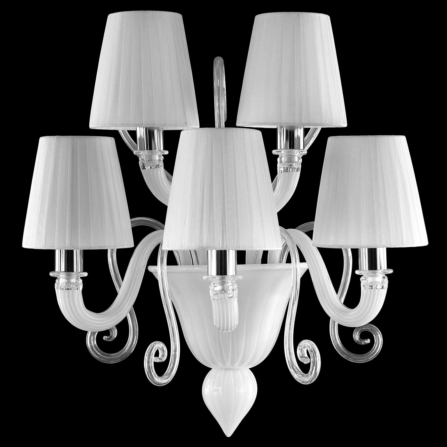 Gatsby wall 5-light, white encased Murano glass. 'Reversed' decorative curl elements. White handmade organza plissé lampshades
The collection Gatsby is the perfect combination of elegant and modern elements. The use of colour featuring bright tones,
