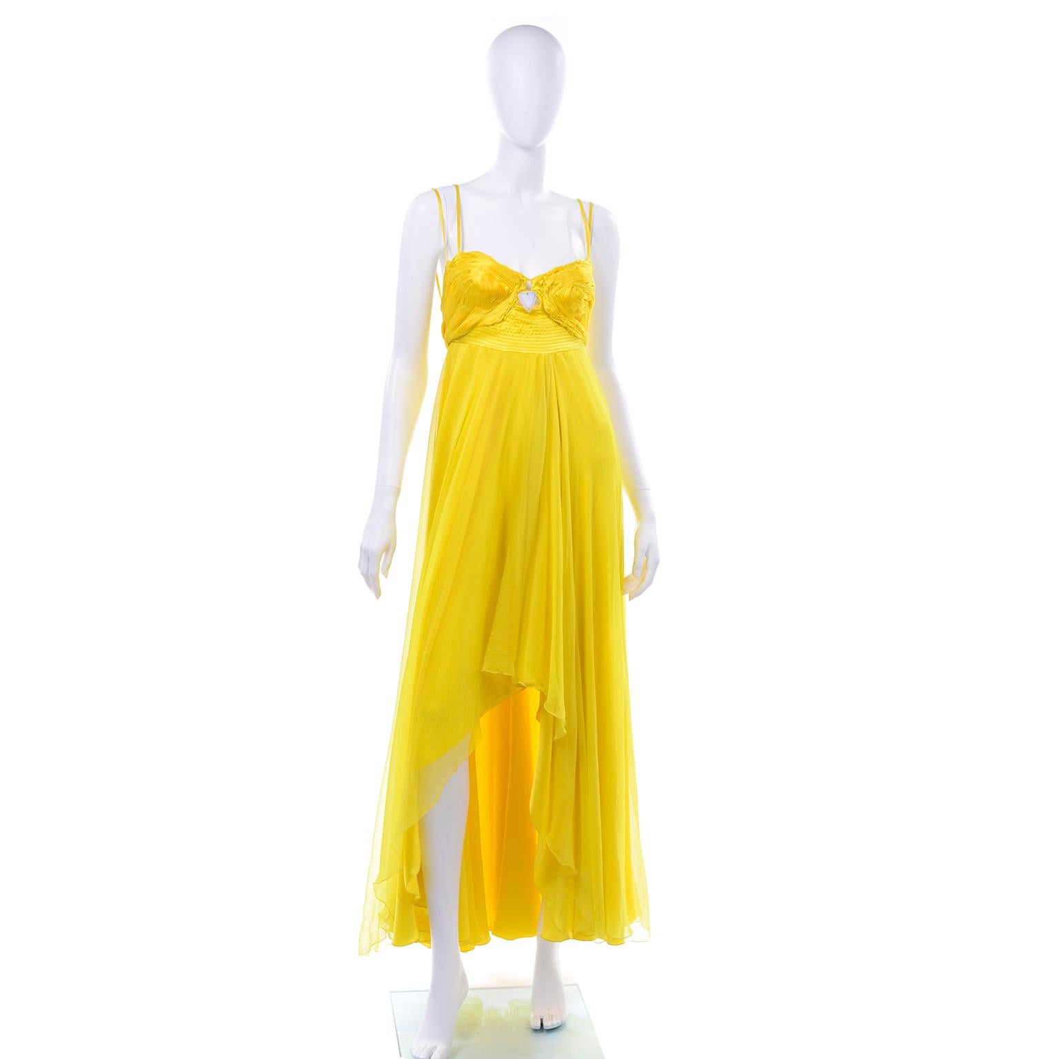 This is an incredible Italian yellow silk high low dress with soutache bust detail from Gattinoni. We love the beautiful textures and different silks used for this dress. This has an empire style waistband and the cups of this dress are lined with a