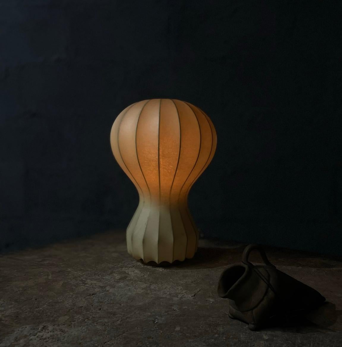 This Small Gatto lamp is original from the 1960s - by Achille and Pier Giacomo Castiglioni for Flos. In exceptional condition for age. Only small minor micro holes  no large or structural damages (as seen in last image). The lamp still features the