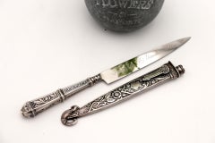 Gaucho-style silver dagger with reliefs and applications
