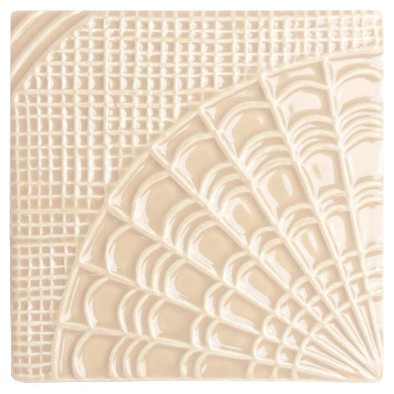 Laced blankets, crochet throws and knitted mantles are at the heart of Gaudí. Handmade is the focal point to the Gaudí tile, where soft lines create a weft for an intricate lace to evolve. The result is a tile which is antique in its look, but
