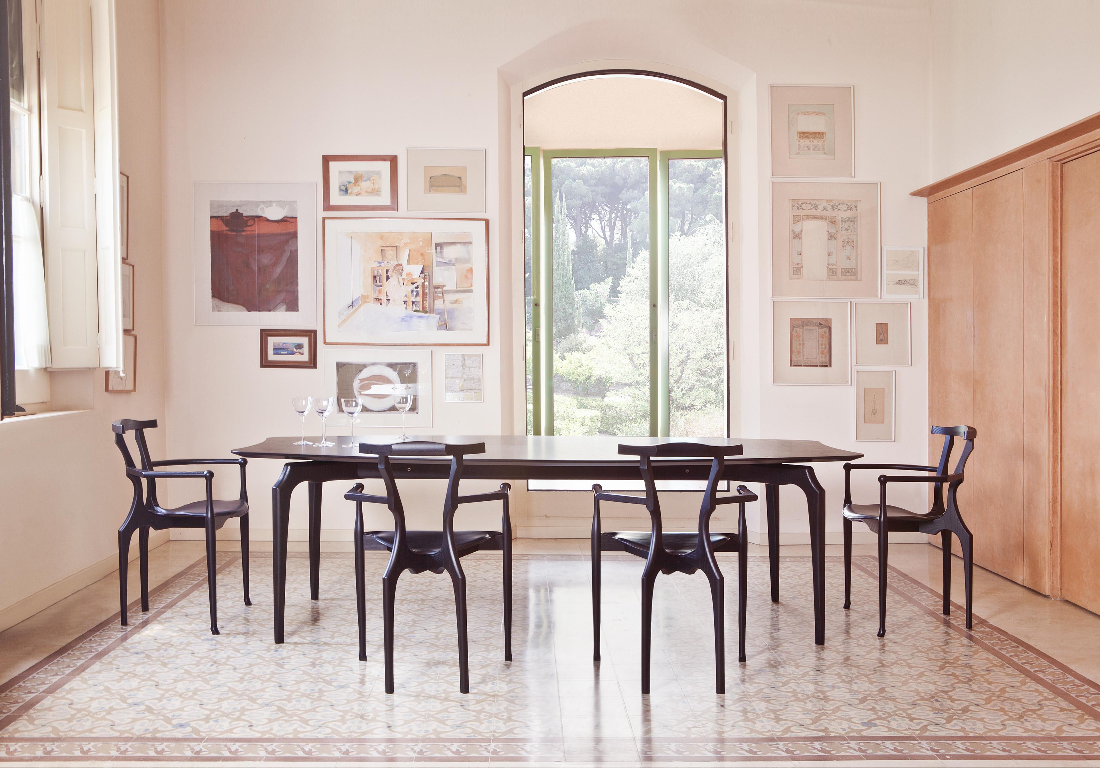 Gaulino Dining table 
300cm length 
240cm length option available 

Finish options and Materials: 
Tabletop in MDF veneered in ash with two finishes: natural varnished or satined black, or veneered in walnut, with a natural varnished effect. 

The