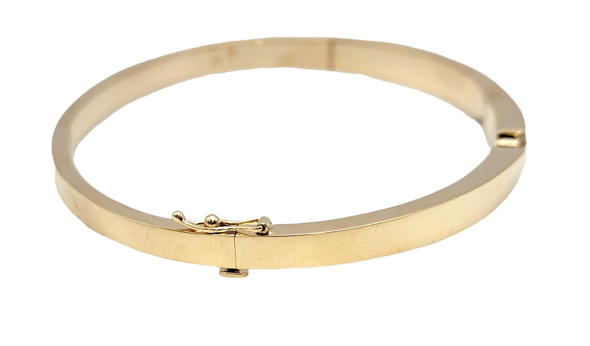 Contemporary Gaulthier Brushed and Polished 14 Karat Gold Crossover Bangle with Diamonds For Sale