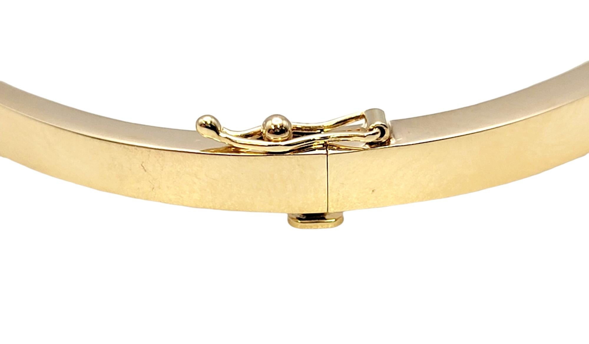 Round Cut Gaulthier Brushed and Polished 14 Karat Gold Crossover Bangle with Diamonds For Sale