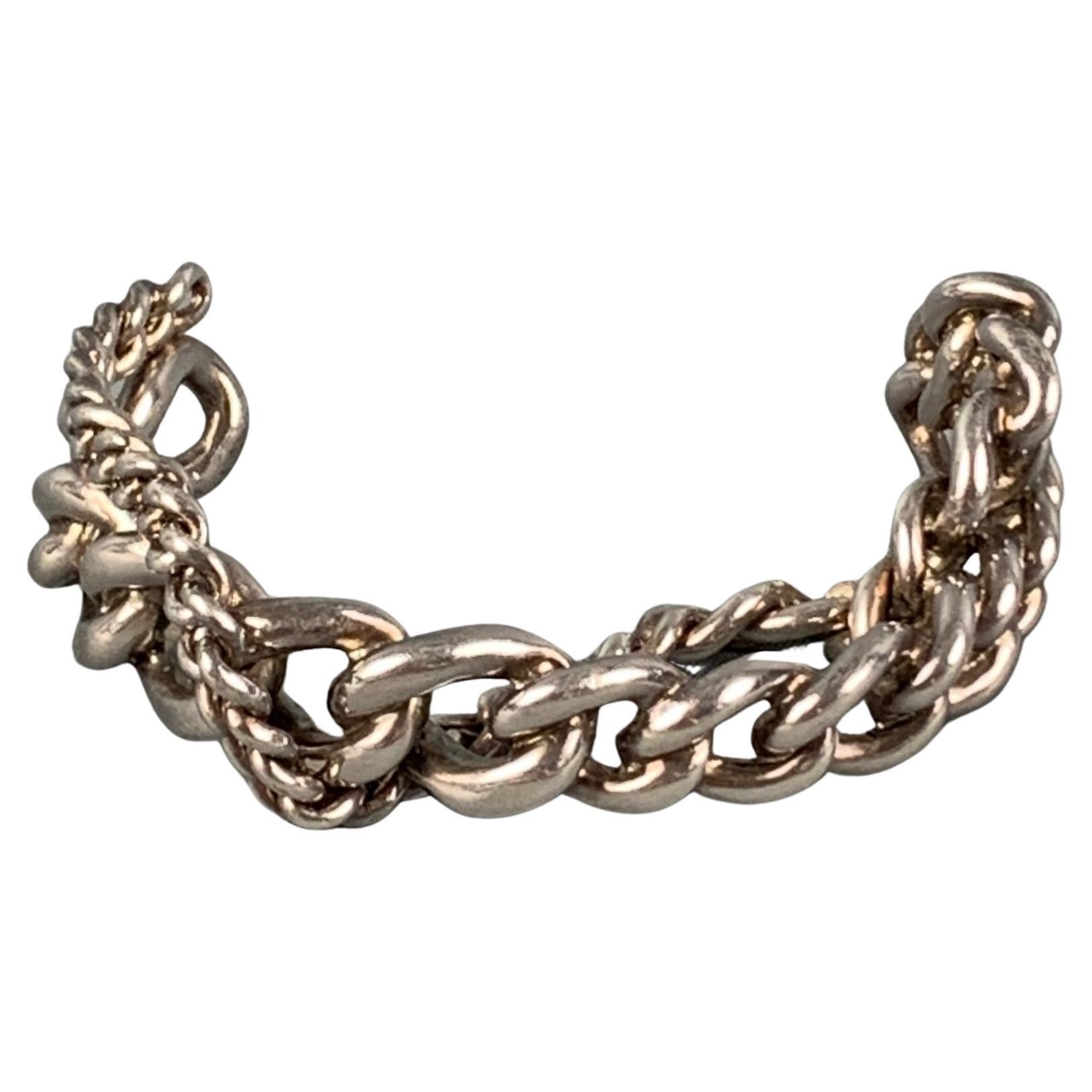 JEAN PAUL GAULTIER Silver Gold and Gunmetal Multi Chain Cuff Bracelet at  1stDibs | jean paul gaultier bracelet, jean paul gaultier chain, bracelet  jean paul gaultier
