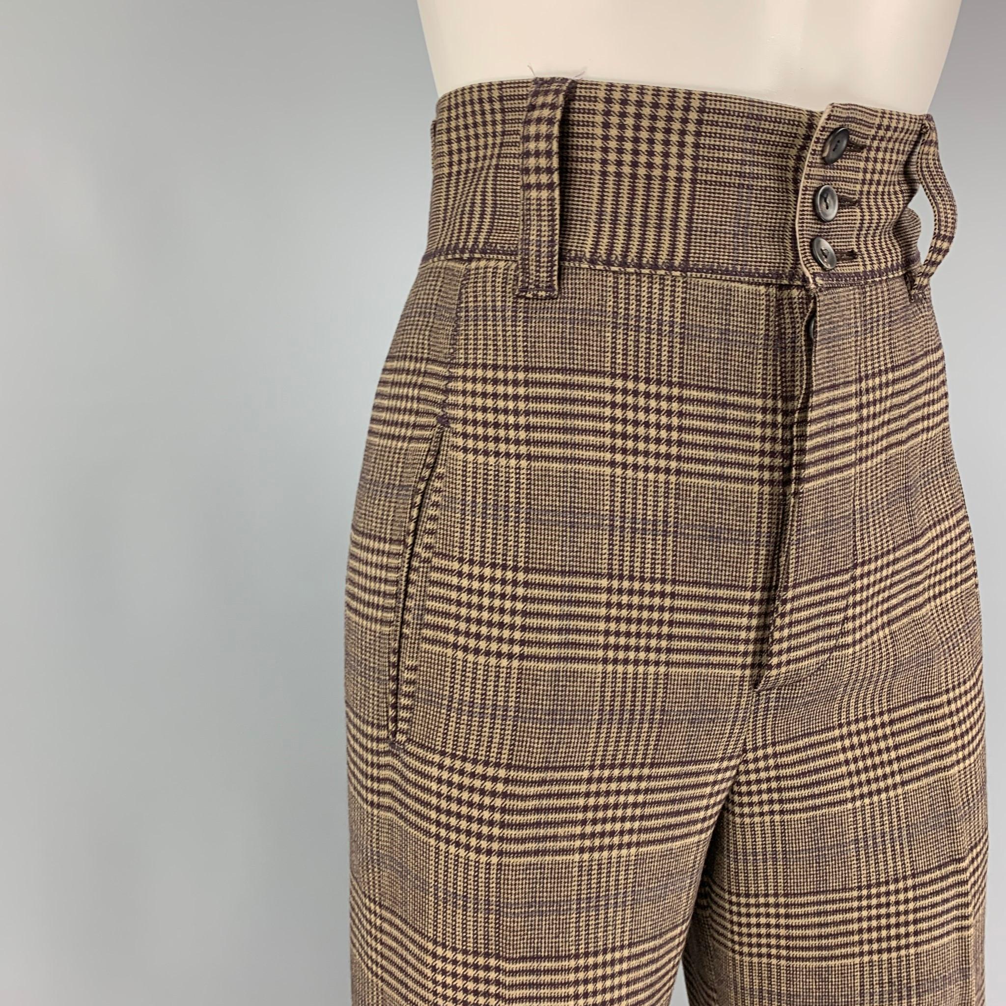 GAULTIER2 by JEAN PAUL GAULTIER dress pants comes in a brown & tan plaid wool / rayon featuring a high waisted style, cuffed, and a button fly closure. Made in Italy. 

Very Good Pre-Owned Condition.
Marked: I 40 / D 36 / F 36 / GB 8 / USA