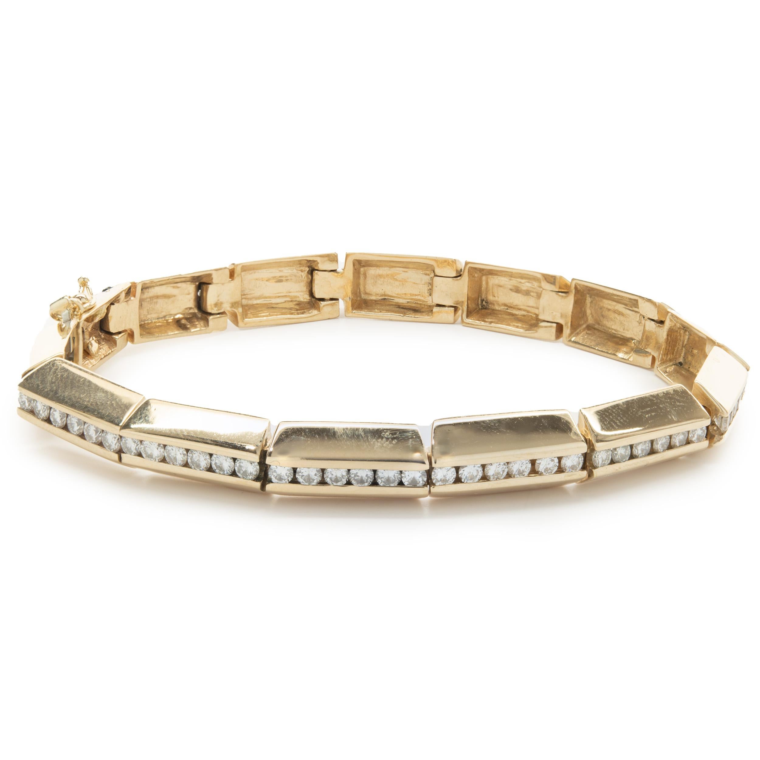 Designer: Gauthier
Material: 14K yellow gold
Diamond: 84 round brilliant cut = 2.52cttw
Color: G
Clarity: VS2 
Weight: 30.22 grams
Measurements: bracelet measures 7.5-inches in length