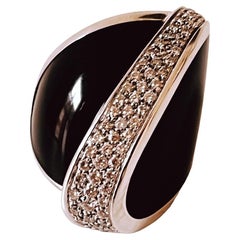 Vintage Gavello 18ct White Gold and Black Enamel Ring with a Raised 0.6ct Pave Diamonds