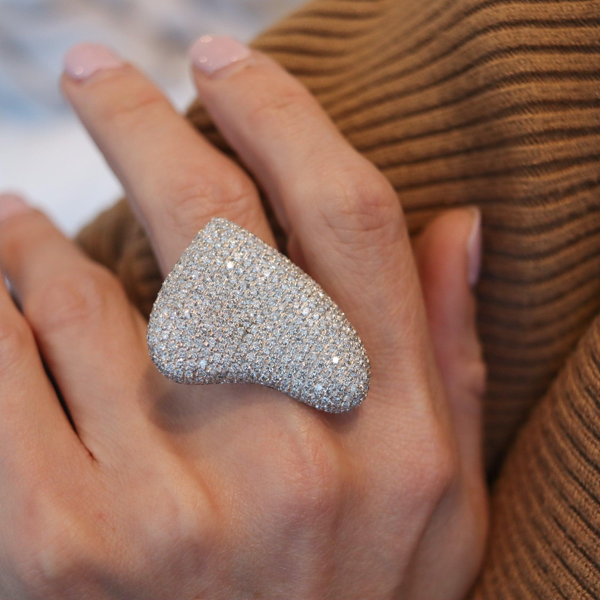 A heart shaped cocktail ring designed by Gavello.

This fabulous heart-shaped cocktail ring was created in Milan Italy by the jewelry house of Gavello. The contemporary ring is pretty oversized and bold. Was crafted in solid white gold of 18 karats